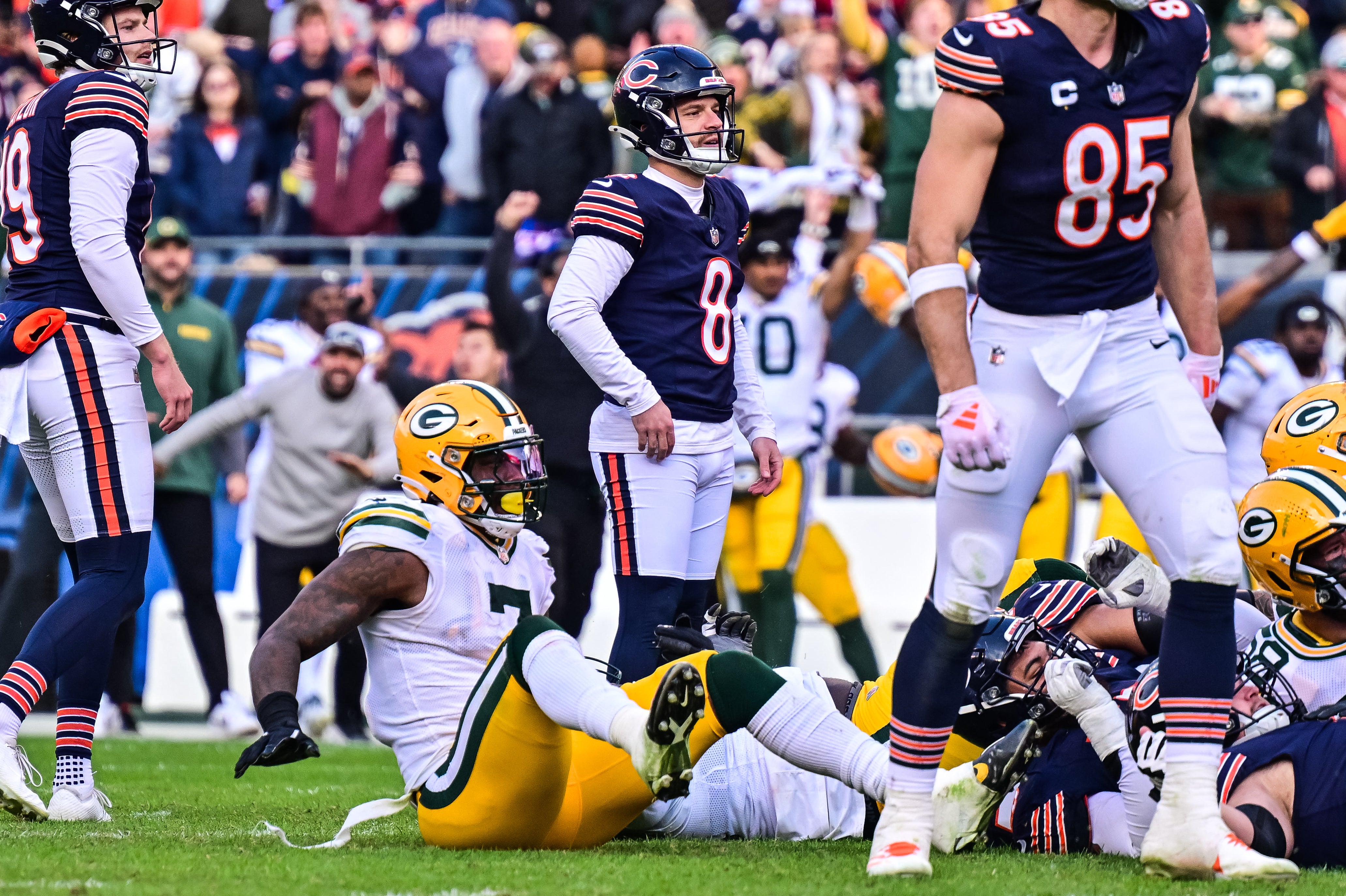 Nov 17, 2024; Chicago, Illinois, USA; Chicago Bears kicker Cairo Santos (8) looks on after his game winning field goal attempt is blocked by Green Bay Packers defensive tackle Karl Brooks (not pictured) during the fourth quarter at Soldier Field.