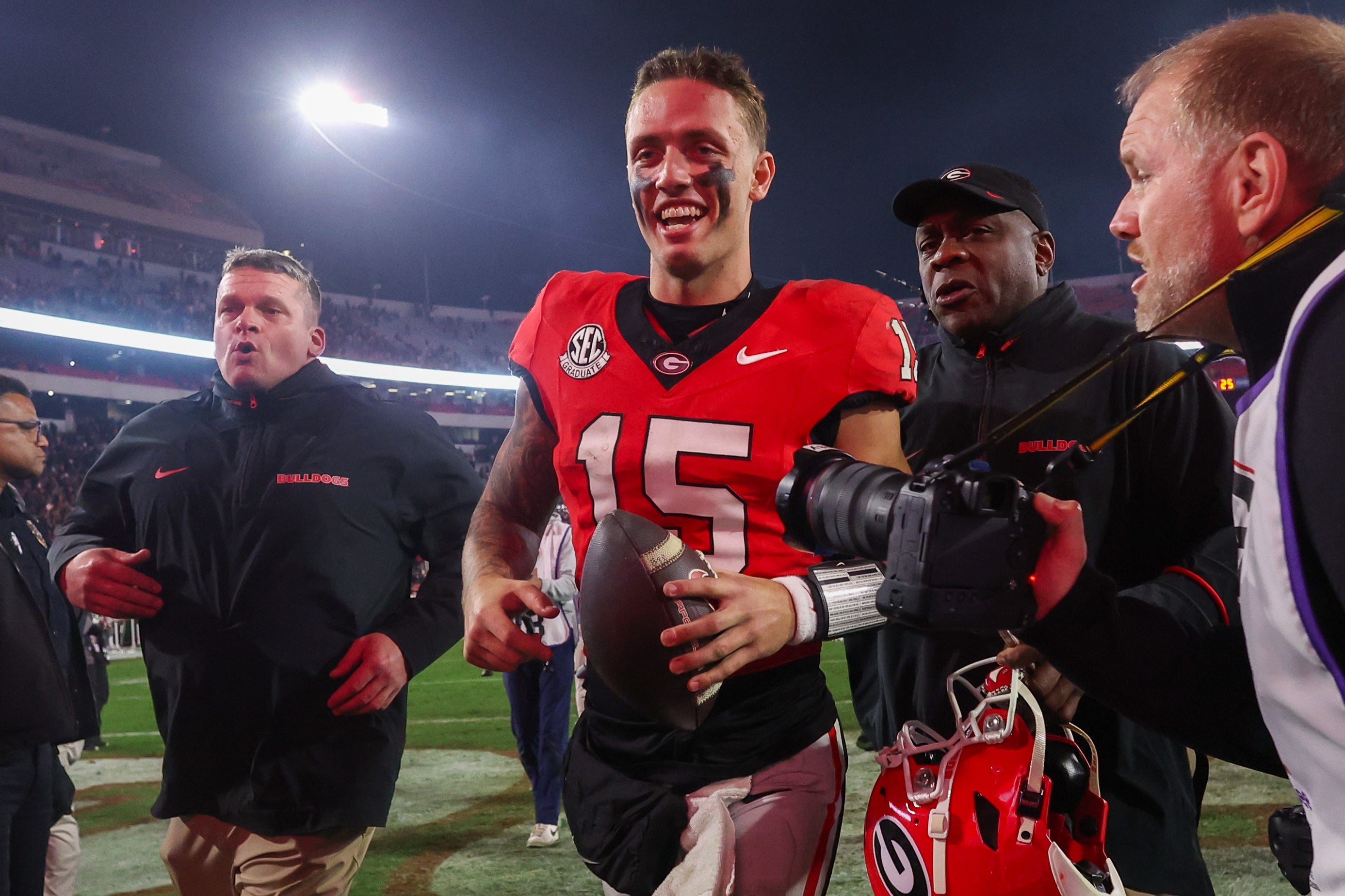 Georgia Bulldogs quarterback Carson Beck (15) celebrates after a victory over the Tennessee Volunteers at Sanford Stadium.