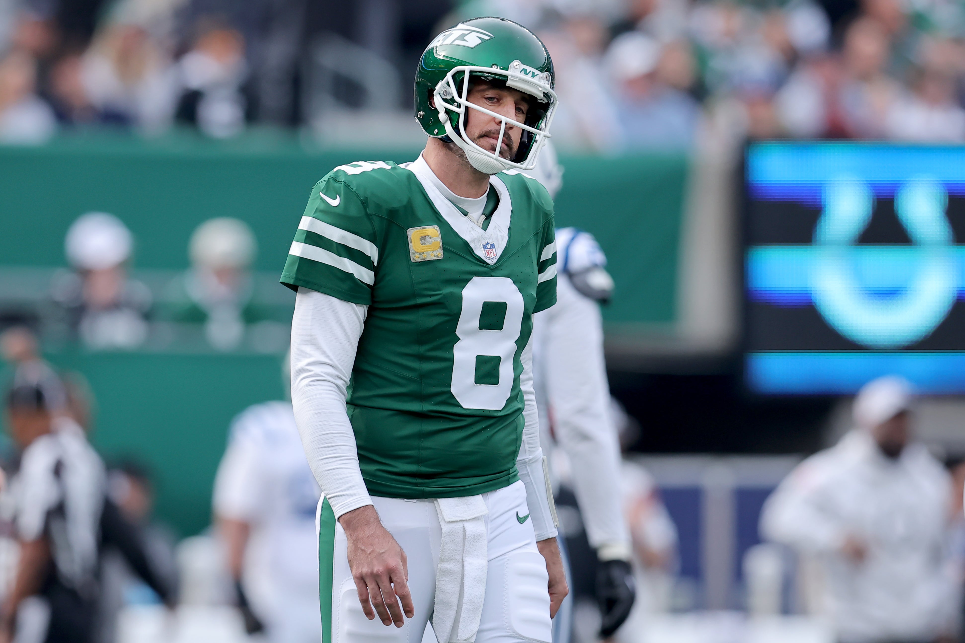 New York Jets quarterback Aaron Rodgers (8) reacts during the first quarter against the Indianapolis Colts at MetLife Stadium.