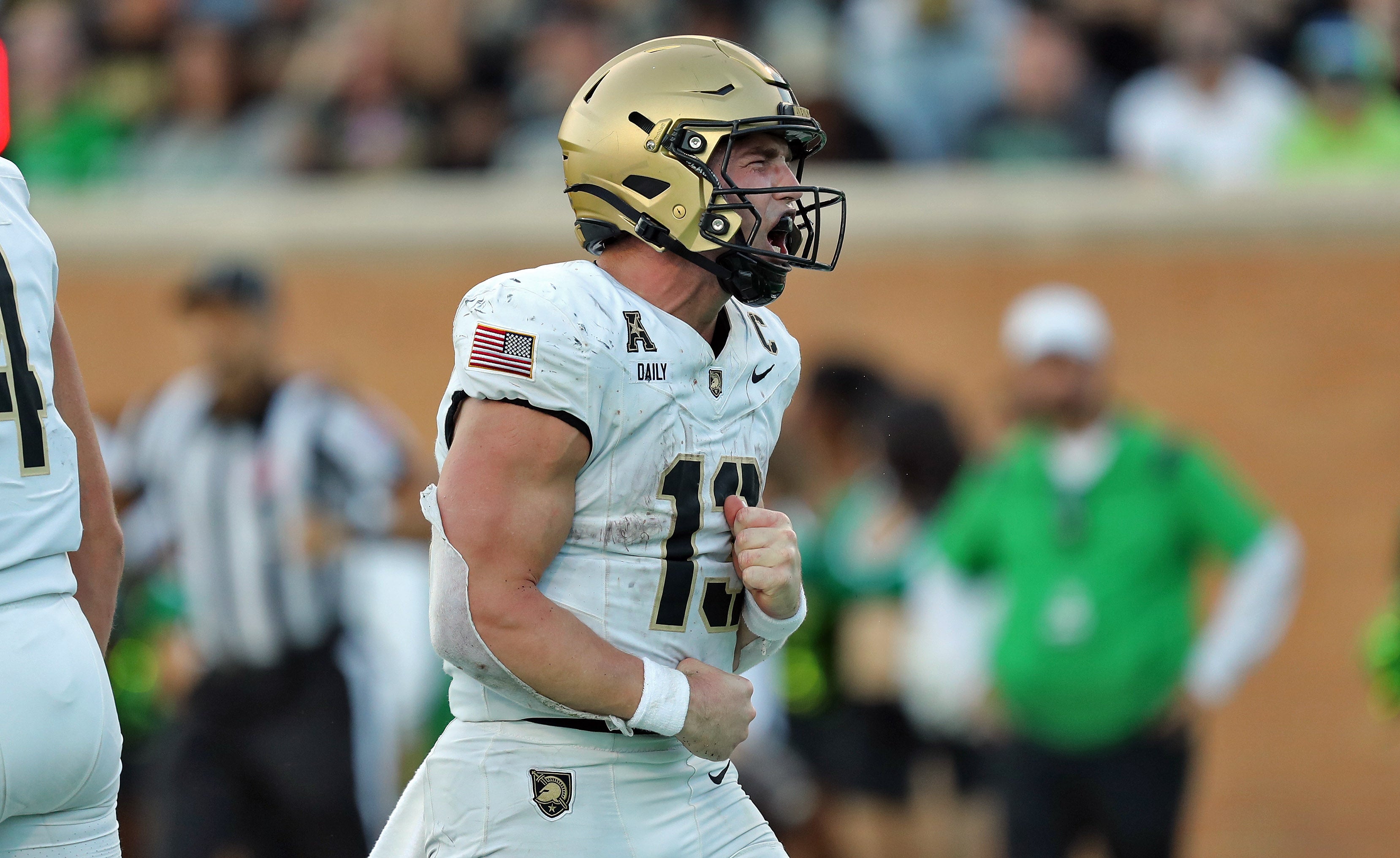 Army Black Knights quarterback Bryson Daily (13) celebrates after scoring his second touchdown against the North Texas Mean Green during the second half at DATCU Stadium.