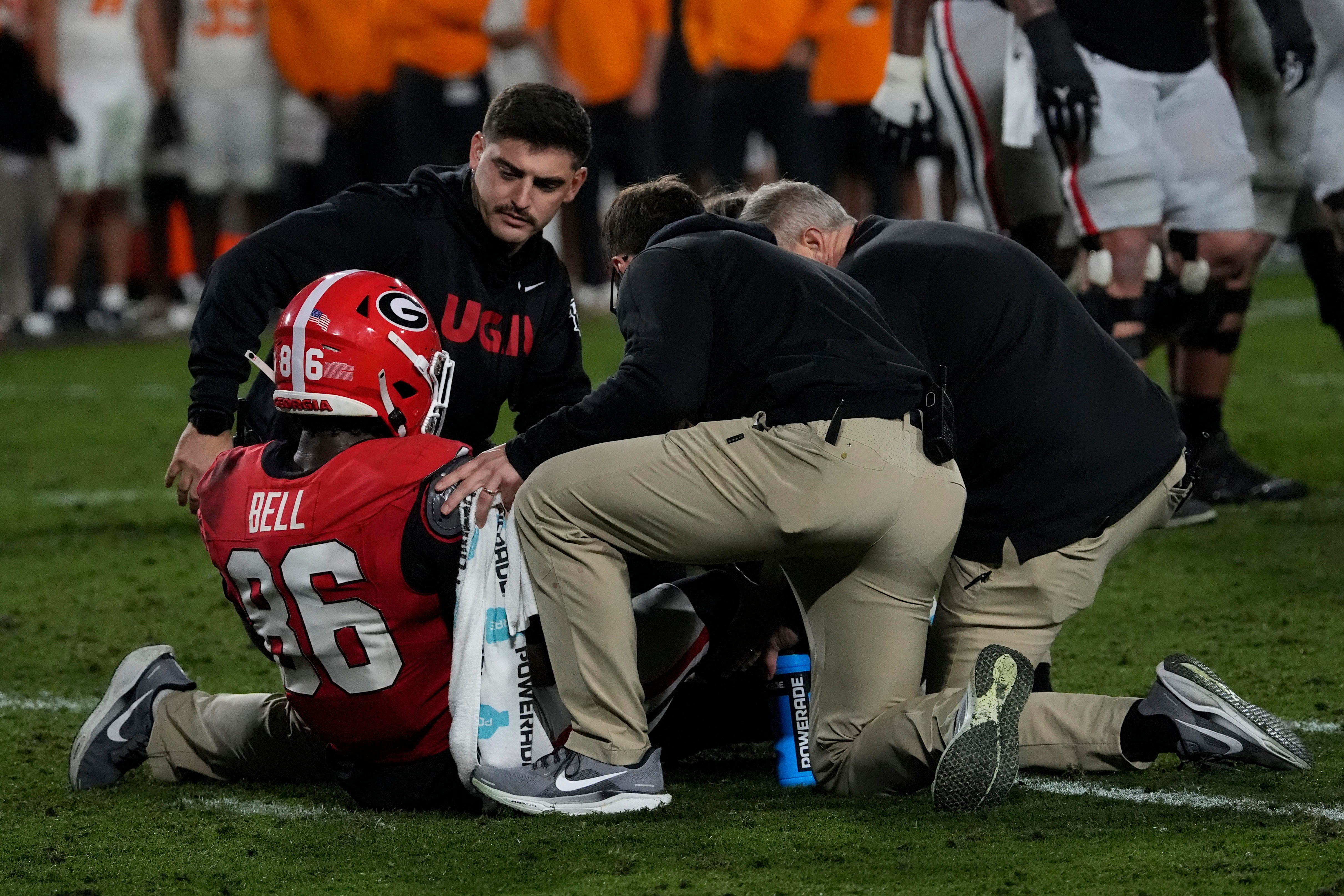 Georgia wide receiver Dillon Bell (86) goes down during the first half of a NCAA college football game against Tennessee in Athens, Ga., on Saturday, Nov. 16, 2024.