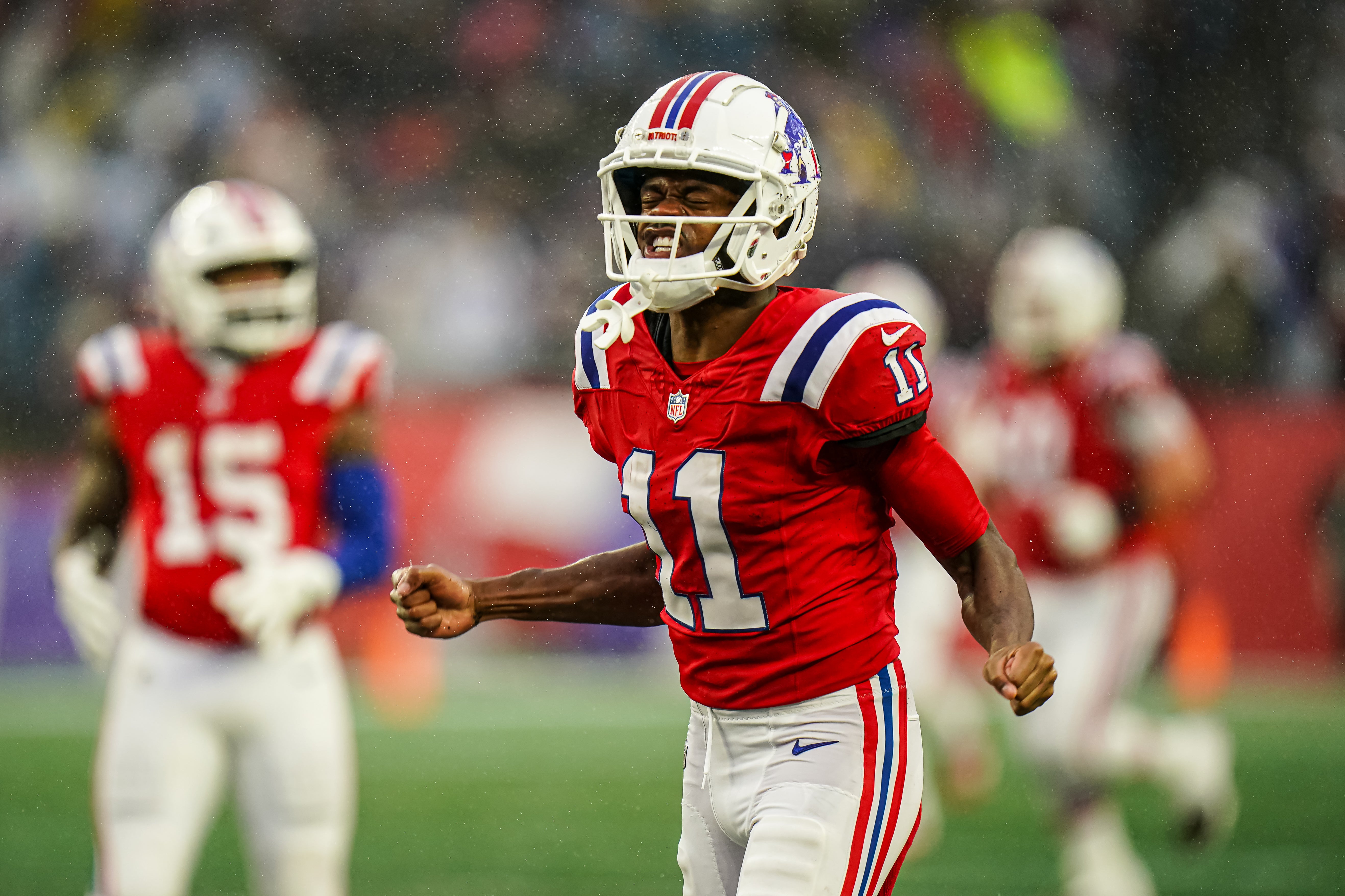 Dec 3, 2023; Foxborough, Massachusetts, USA; New England Patriots wide receiver Tyquan Thornton (11) reacts after running the ball against the Los Angeles Chargers in the second half at Gillette Stadium.