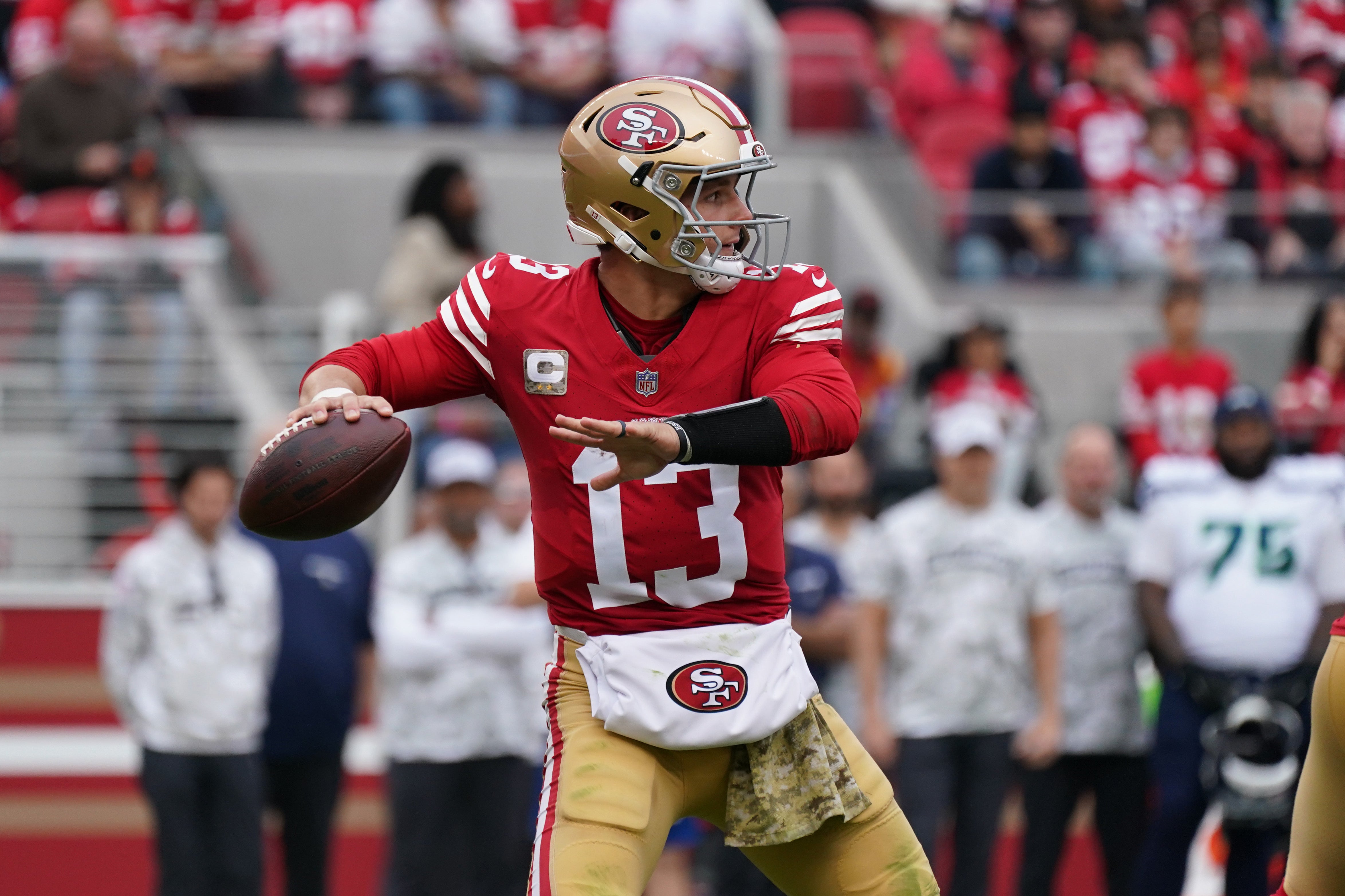 San Francisco 49ers quarterback Brock Purdy (13) throws a pass against the Seattle Seahawks in the second quarter at Levi's Stadium.