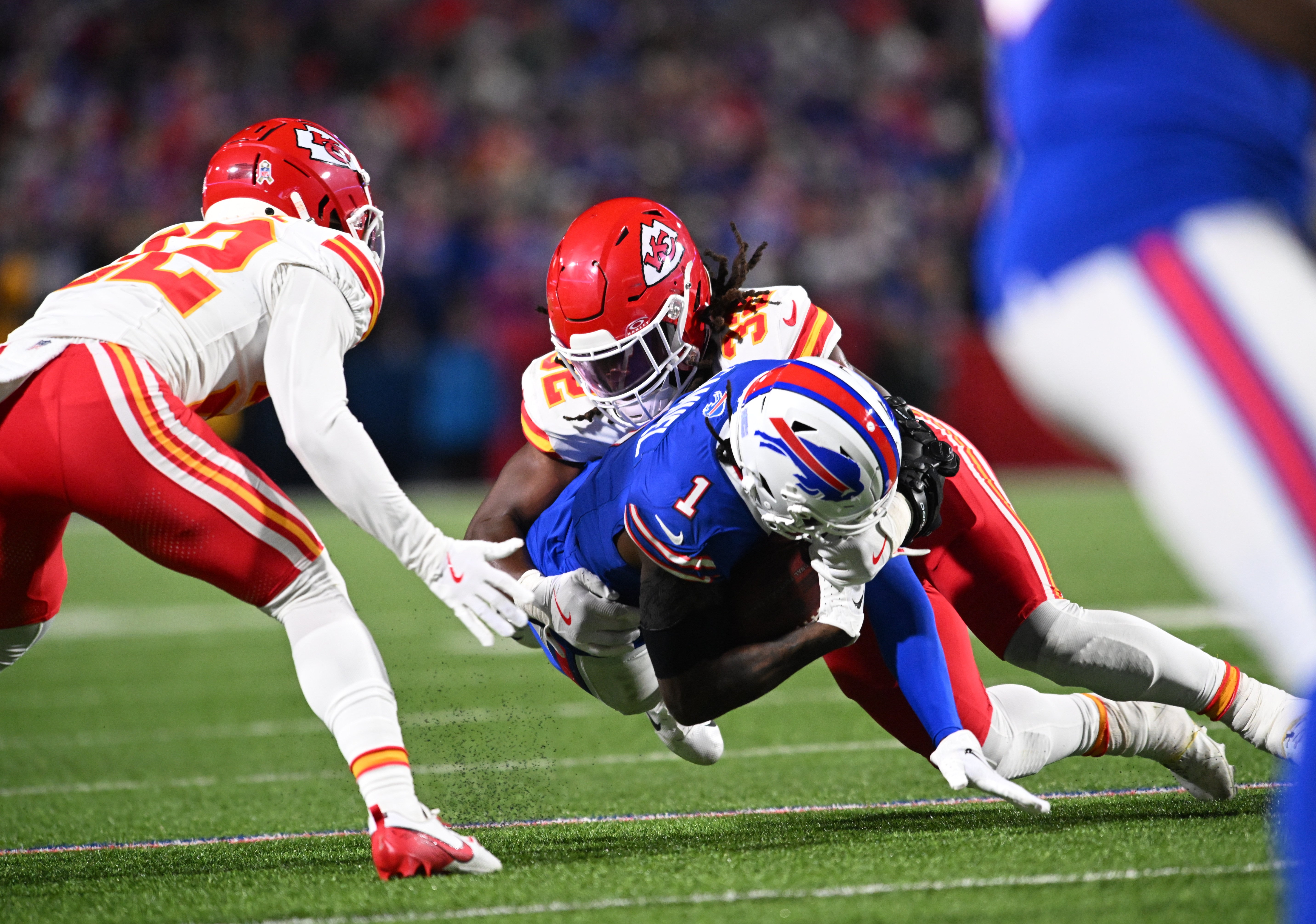 Nov 17, 2024; Orchard Park, New York, USA; Buffalo Bills wide receiver Curtis Samuel (1) is tackled by Kansas City Chiefs linebacker Nick Bolton (32) and cornerback Trent McDuffie (22) in the fourth quarter at Highmark Stadium.