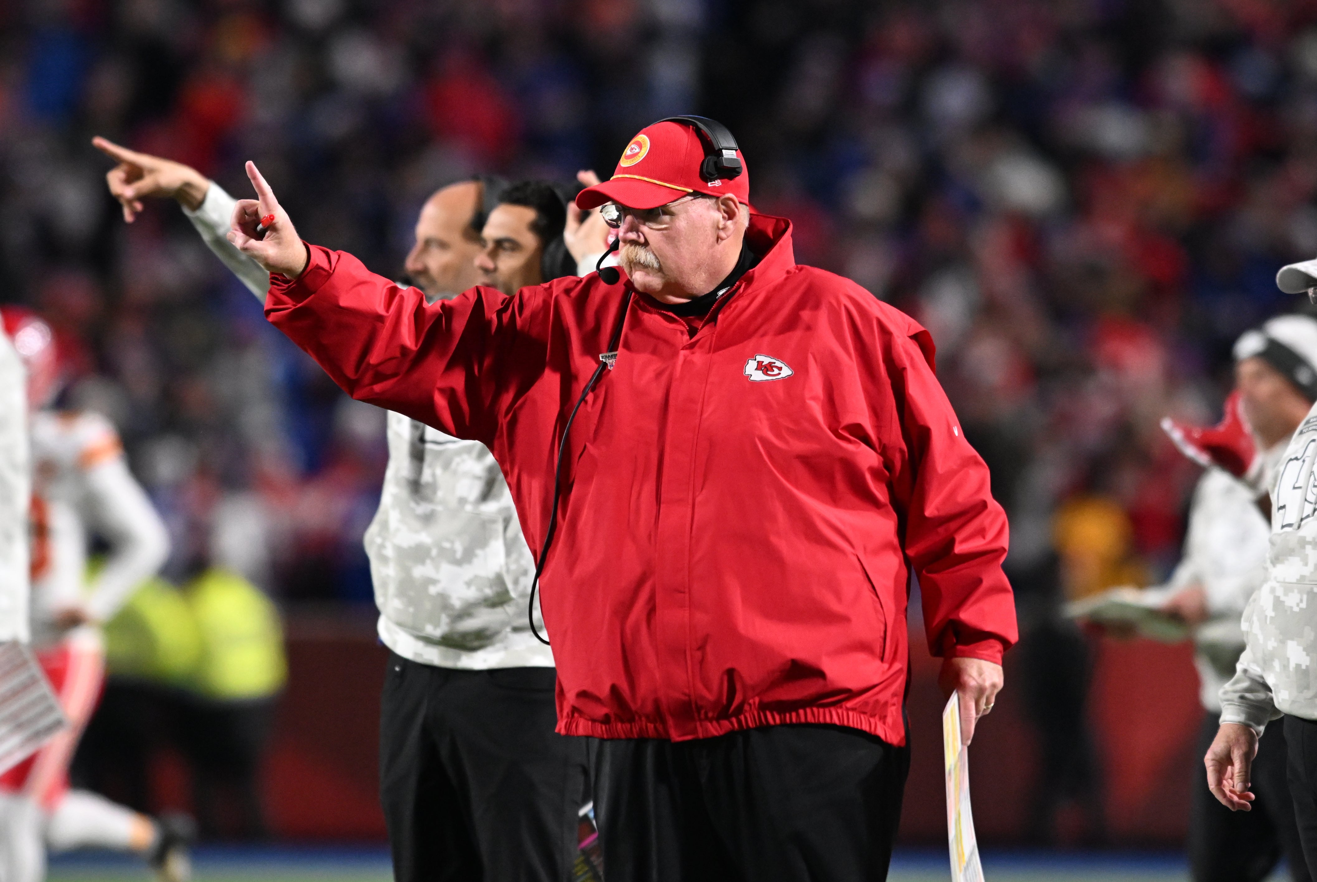 Nov 17, 2024; Orchard Park, New York, USA; Kansas City Chiefs head coach Andy Reid signals to go for one point after a touchdown against the Buffalo Bills in the fourth quarter at Highmark Stadium.