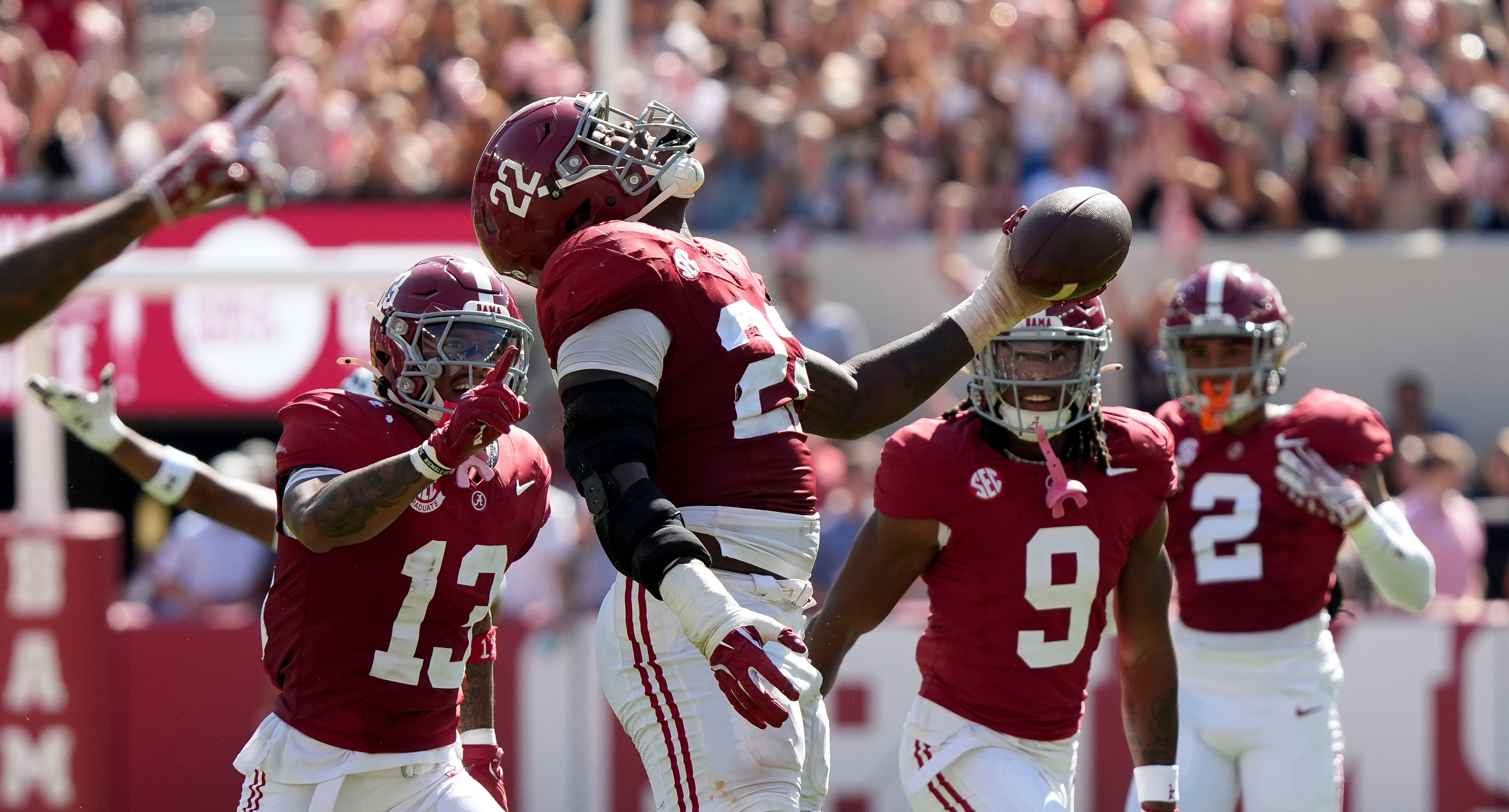 Oct 12, 2024; Tuscaloosa, Alabama, USA; Alabama Crimson Tide defensive lineman LT Overton (22) celebrates after recovering a South Carolina fumble at Bryant-Denny Stadium. Alabama defeated South Carolina 27-25.