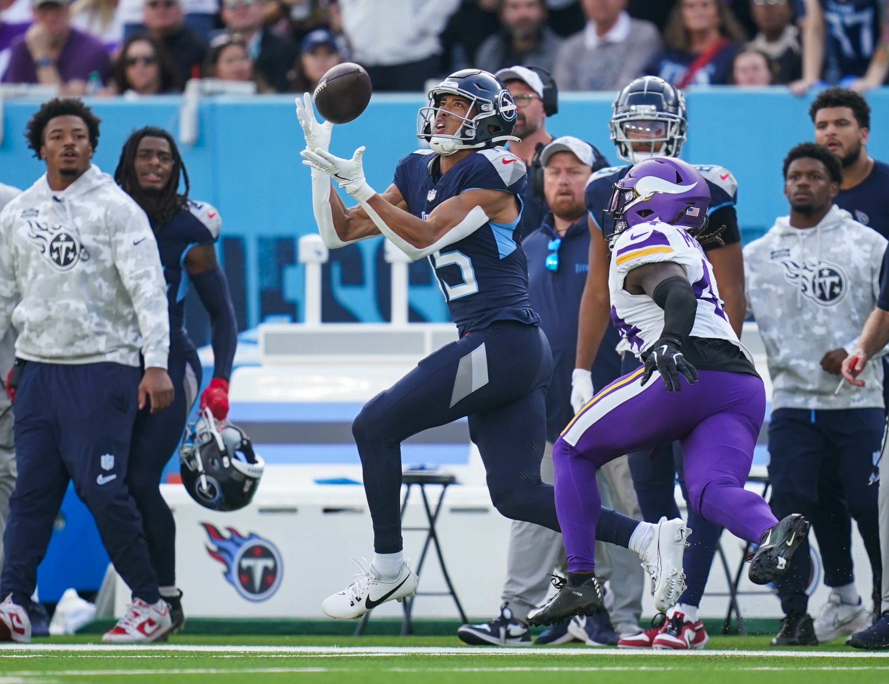Tennessee Titans wide receiver Nick Westbrook-Ikhine (15) pulls down a touchdown pass during the third quarter against the Minnesota Vikings at Nissan Stadium in Nashville, Tenn., Sunday, Nov. 17, 2024.