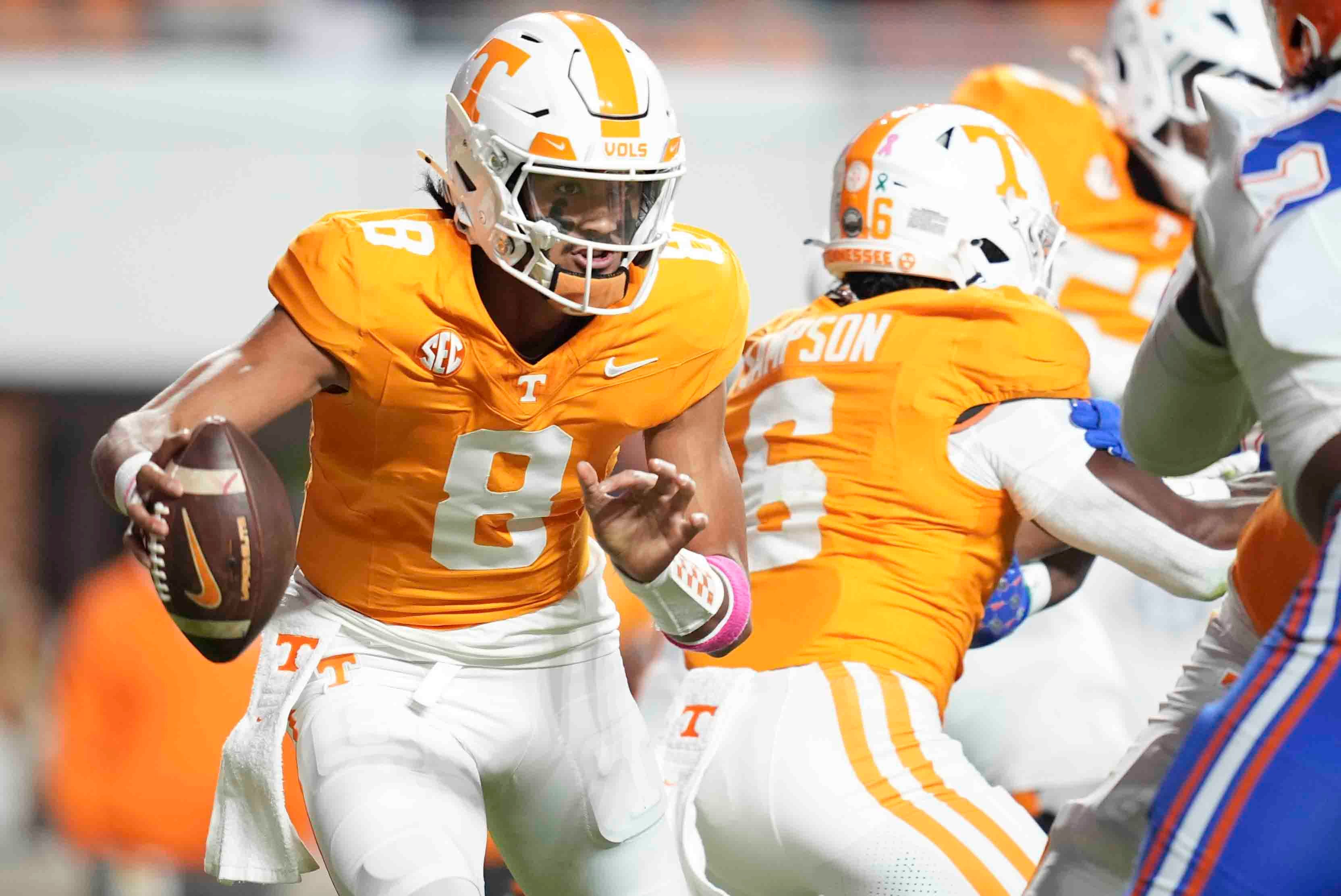 Oct 12, 2024; Knoxville, Tennessee, USA; Tennessee Volunteers quarterback Nico Iamaleava (8) scrambles with the ball against the Florida Gators at Neyland Stadium.