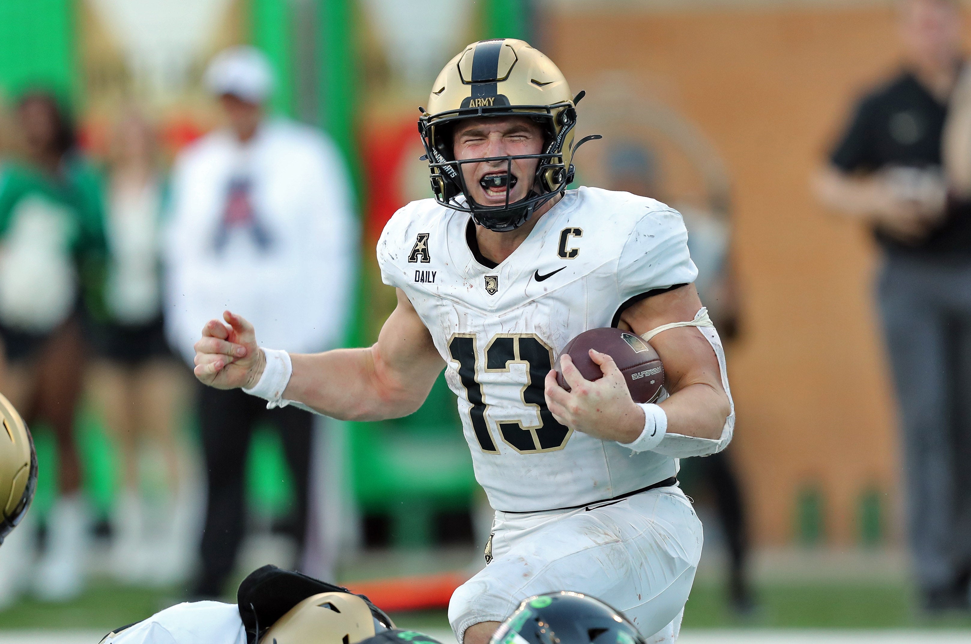 Army Black Knights quarterback Bryson Daily (13) celebrates after scoring his second touchdown against the North Texas Mean Green during the second half at DATCU Stadium.