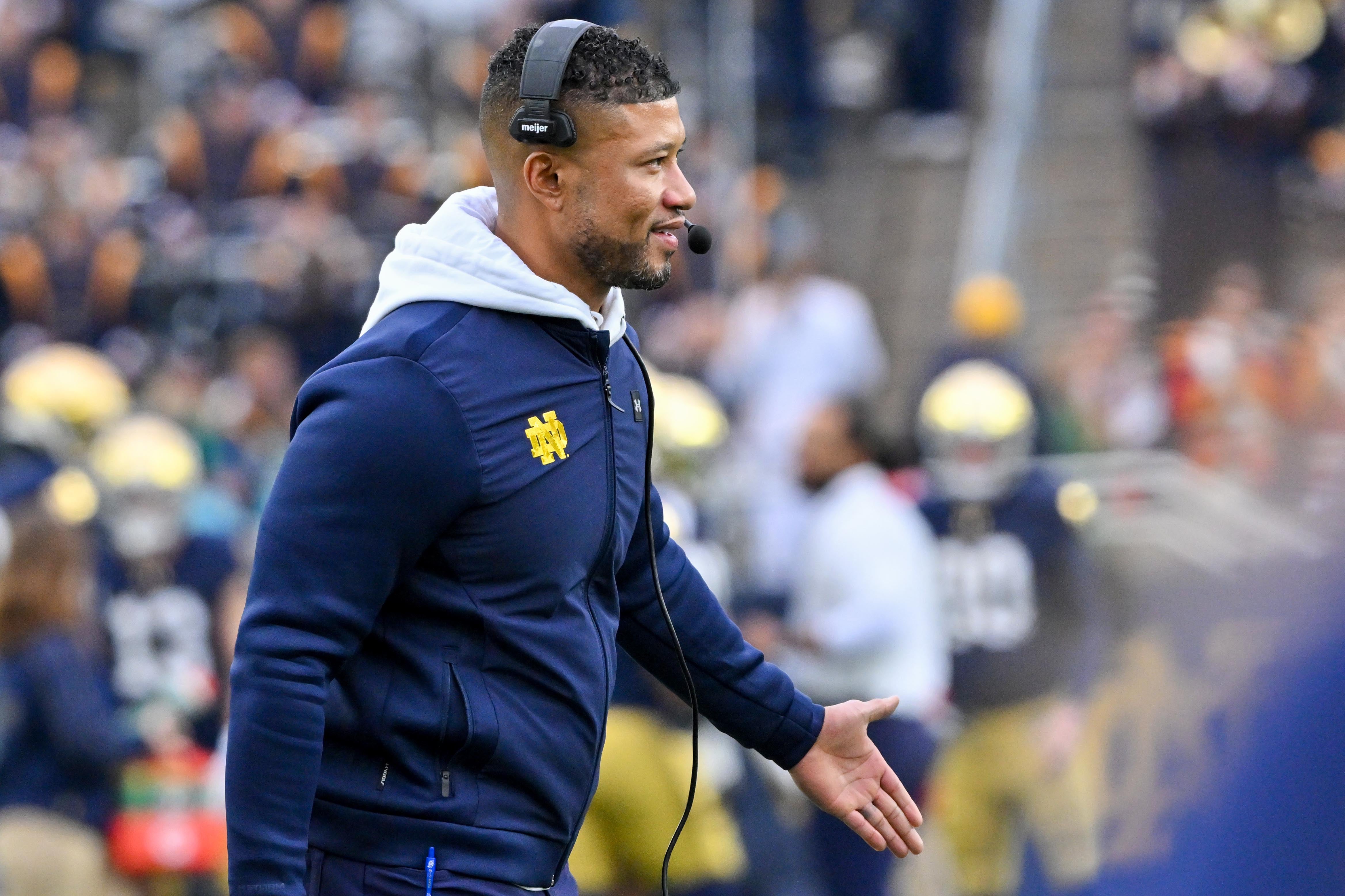 Notre Dame Fighting Irish head coach Marcus Freeman looks on in the first quarter against the Virginia Cavaliers at Notre Dame Stadium.