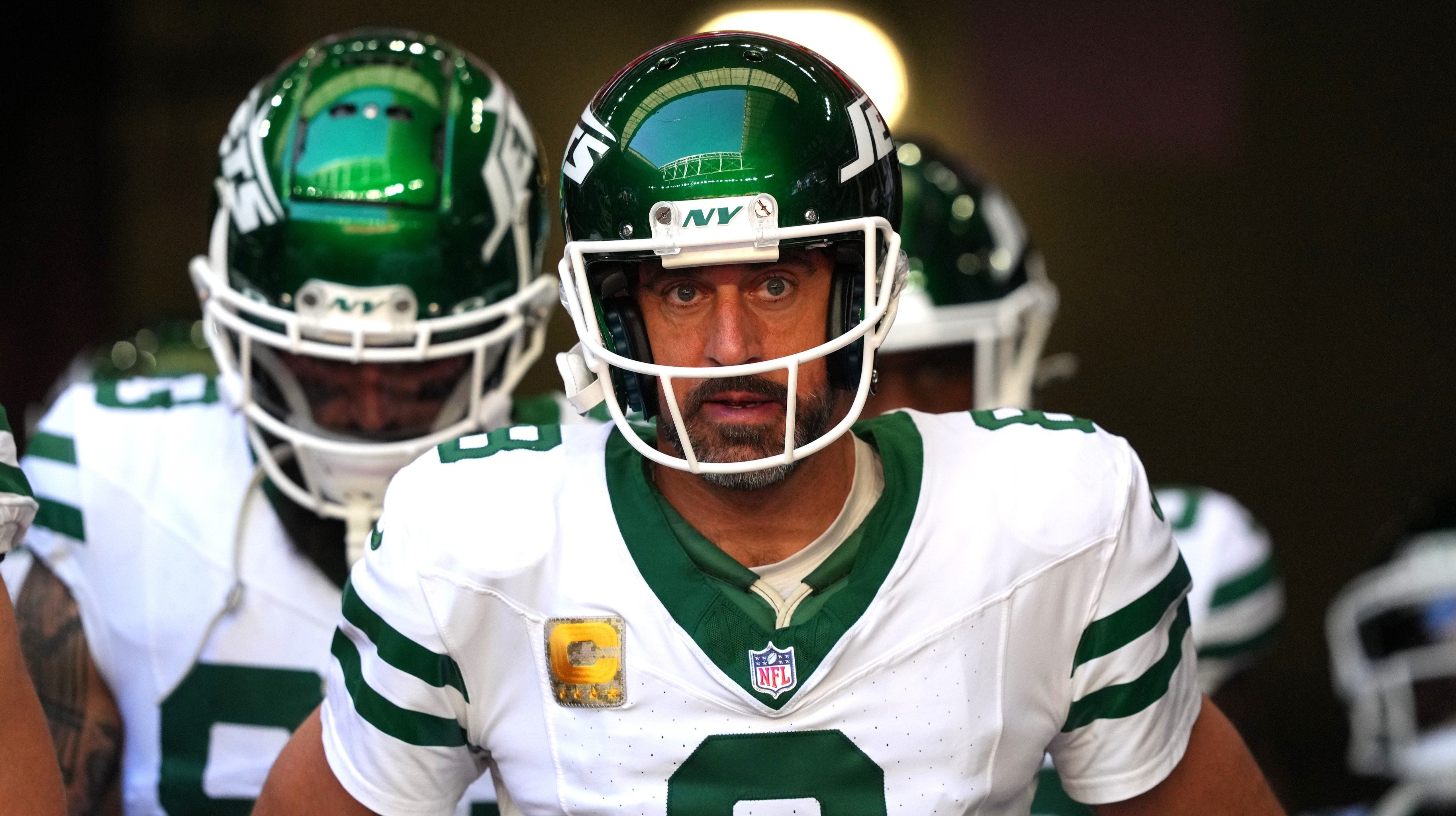 Nov 10, 2024; Glendale, Arizona, USA; New York Jets quarterback Aaron Rodgers (8) warms up before the game against the Arizona Cardinals at State Farm Stadium.