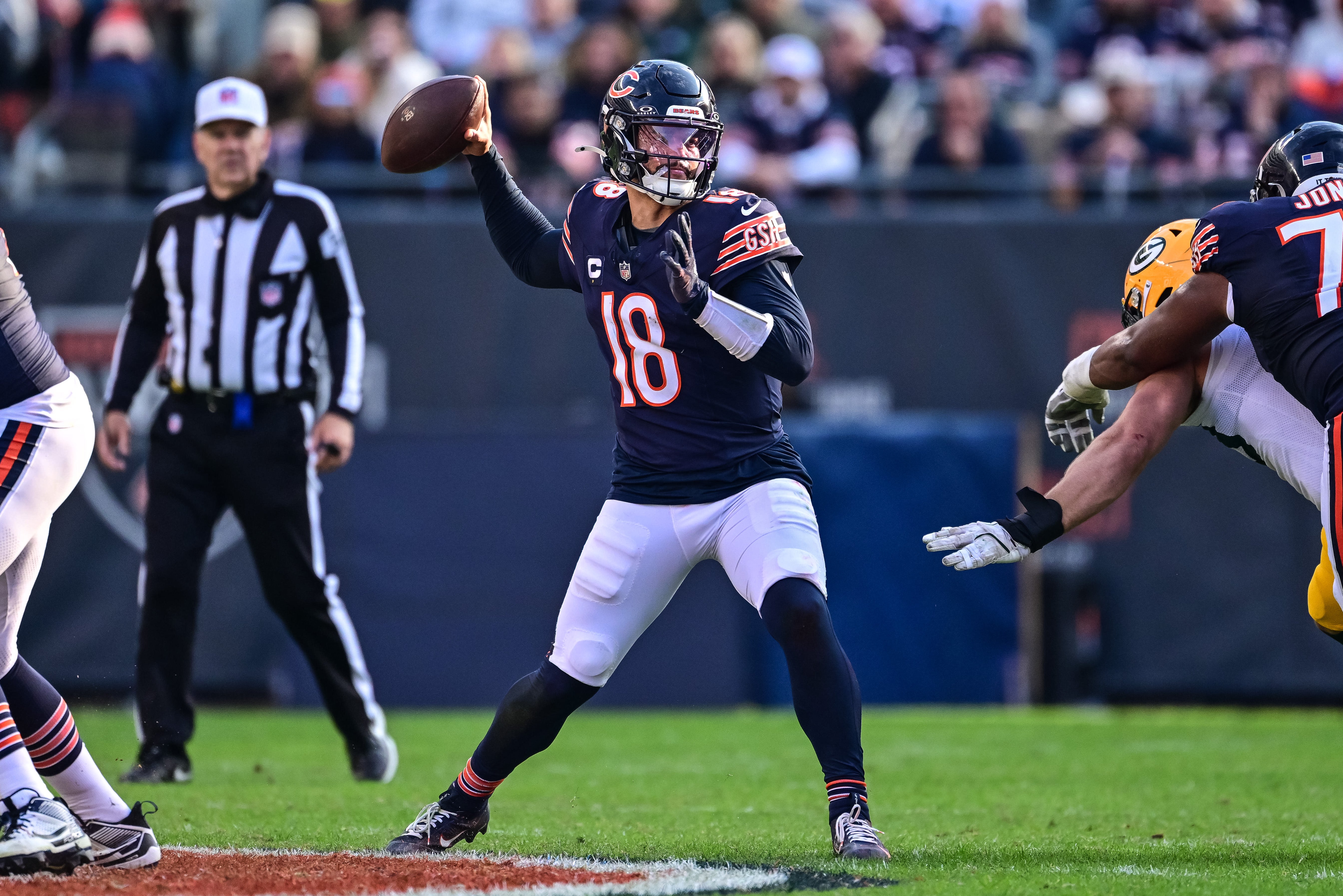 Nov 17, 2024; Chicago, Illinois, USA; Chicago Bears quarterback Caleb Williams (18) passes the ball against the Green Bay Packers during the third quarter at Soldier Field.