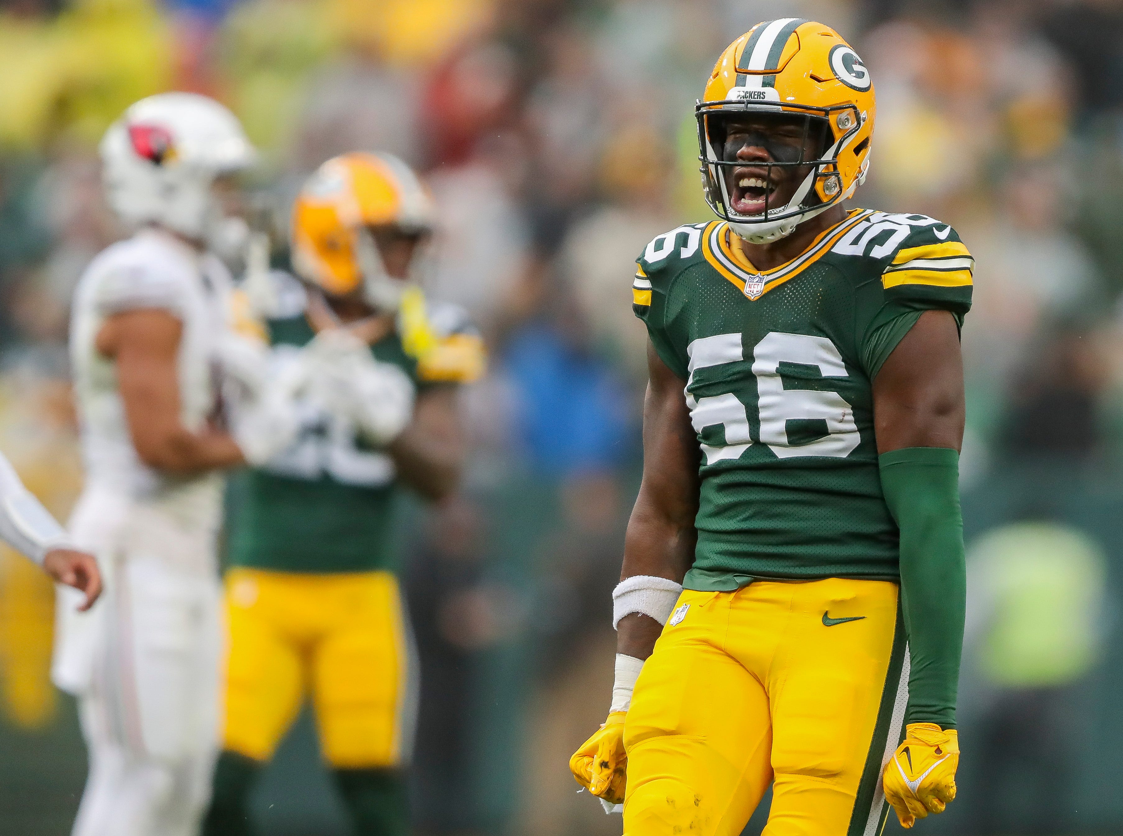 Green Bay Packers linebacker Edgerrin Cooper (56) reacts after making a tackle against the Arizona Cardinals on Sunday, October 13, 2024, at Lambeau Field in Green Bay, Wis. The Packers won the game, 34-13 