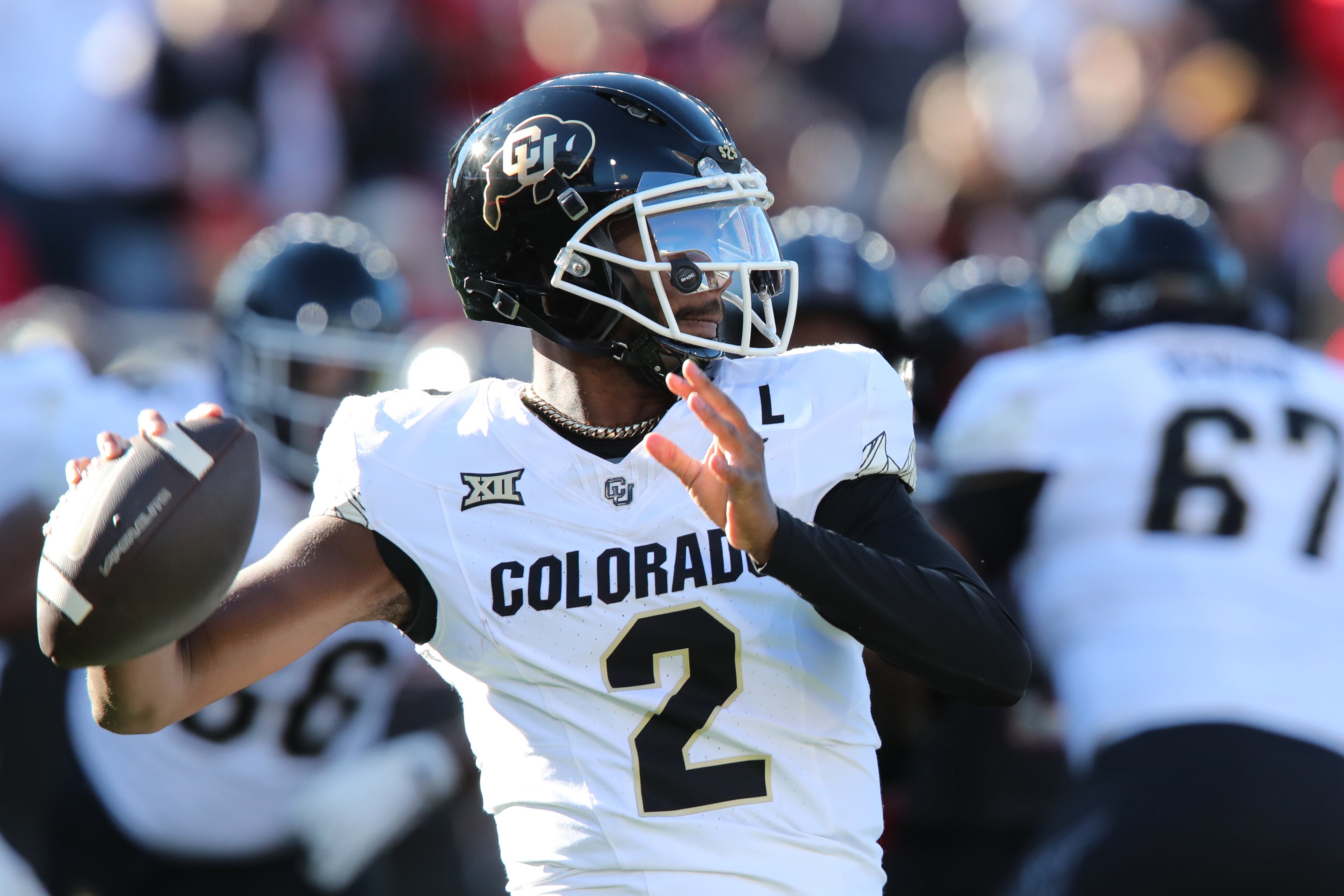 Nov 9, 2024; Lubbock, Texas, USA; Colorado Buffalos quarterback Shedeur Sanders (2) passes against the Texas Tech Red Raiders in the first half at Jones AT&T Stadium and Cody Campbell Field.