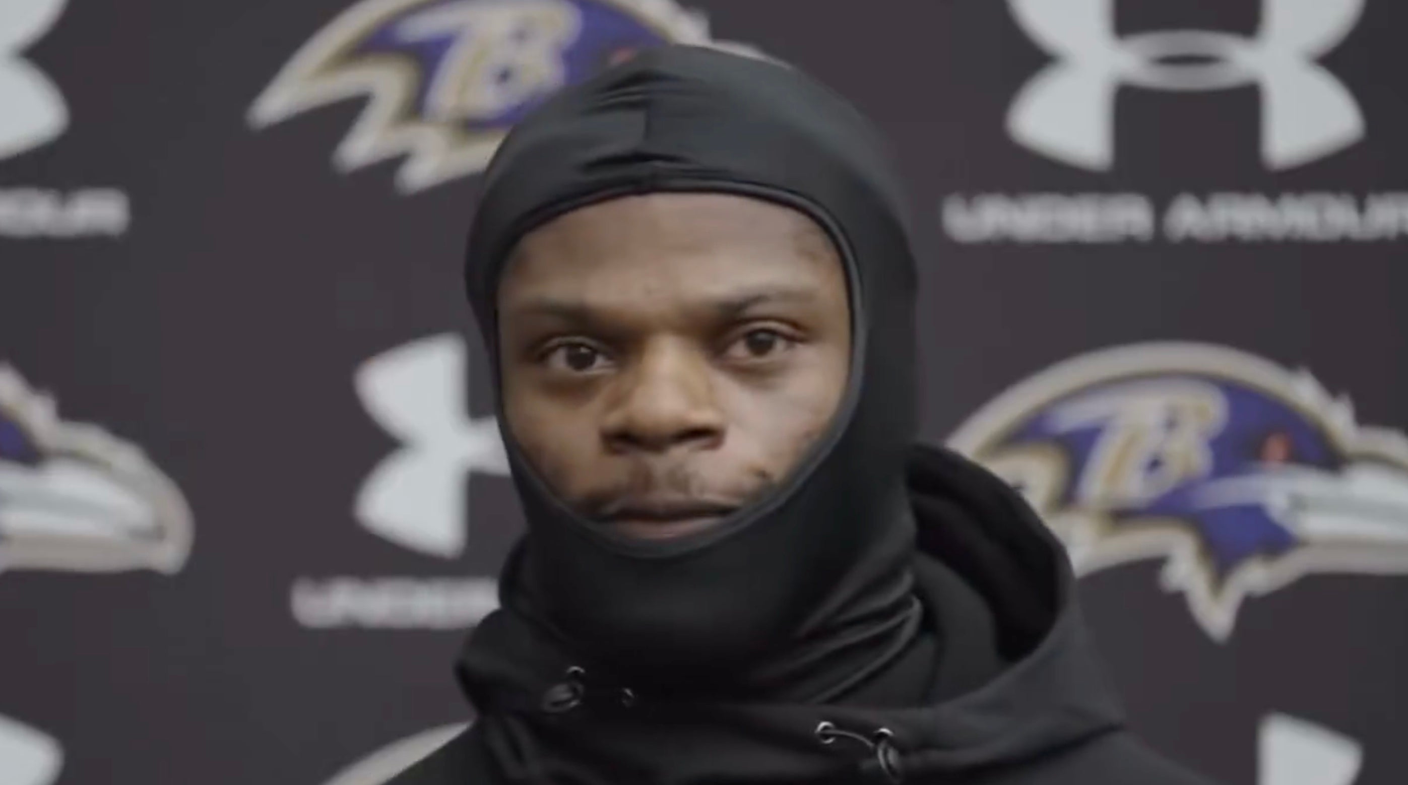 Baltimore Ravens quarterback Lamar Jackson talks to reporters after practice on November 21, 2024.