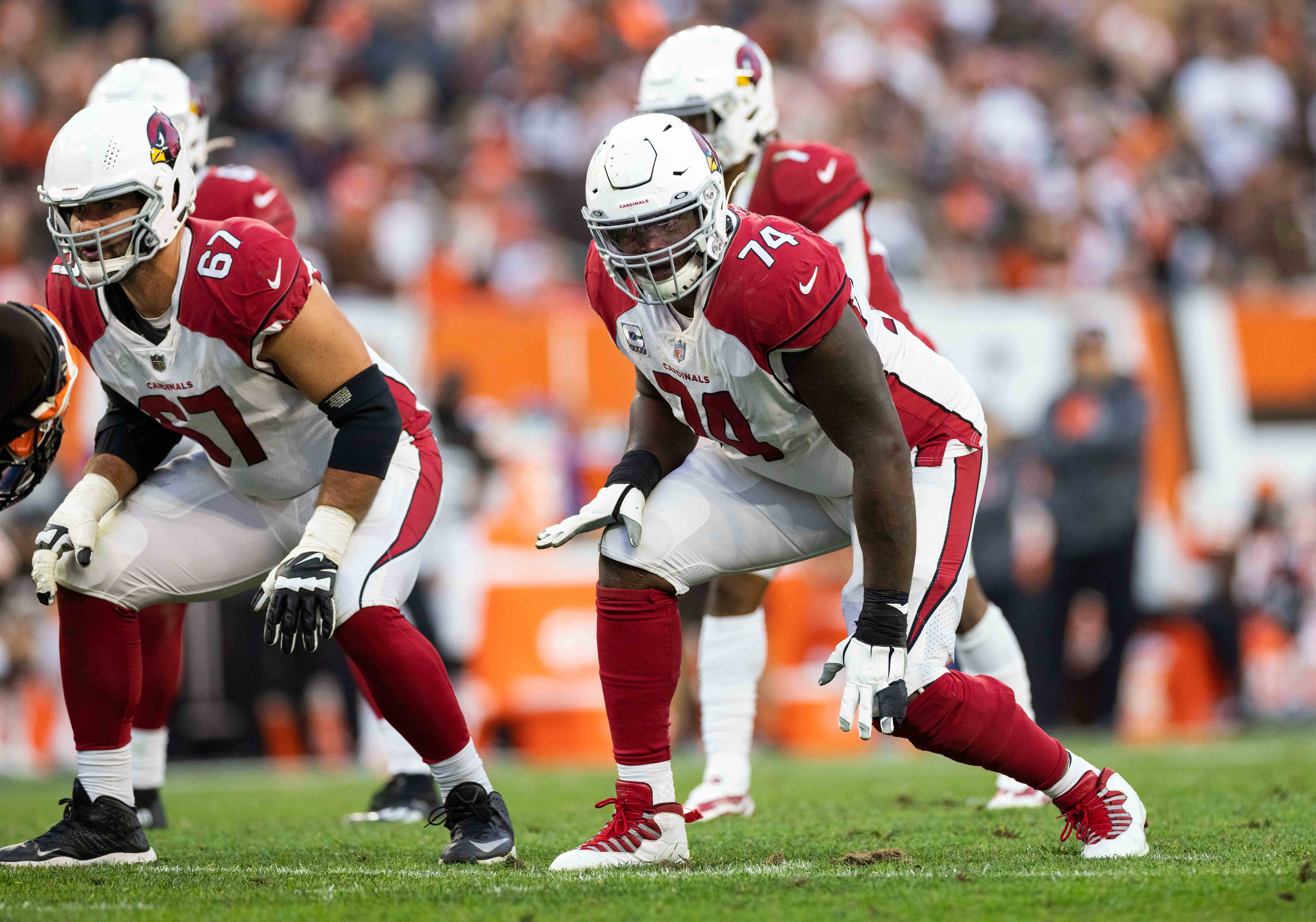 Oct 17, 2021; Cleveland, Ohio, USA; Arizona Cardinals guard Justin Pugh (67) and offensive tackle D.J. Humphries (74) at the line of scrimmage against the Cleveland Browns during the third quarter at FirstEnergy Stadium.