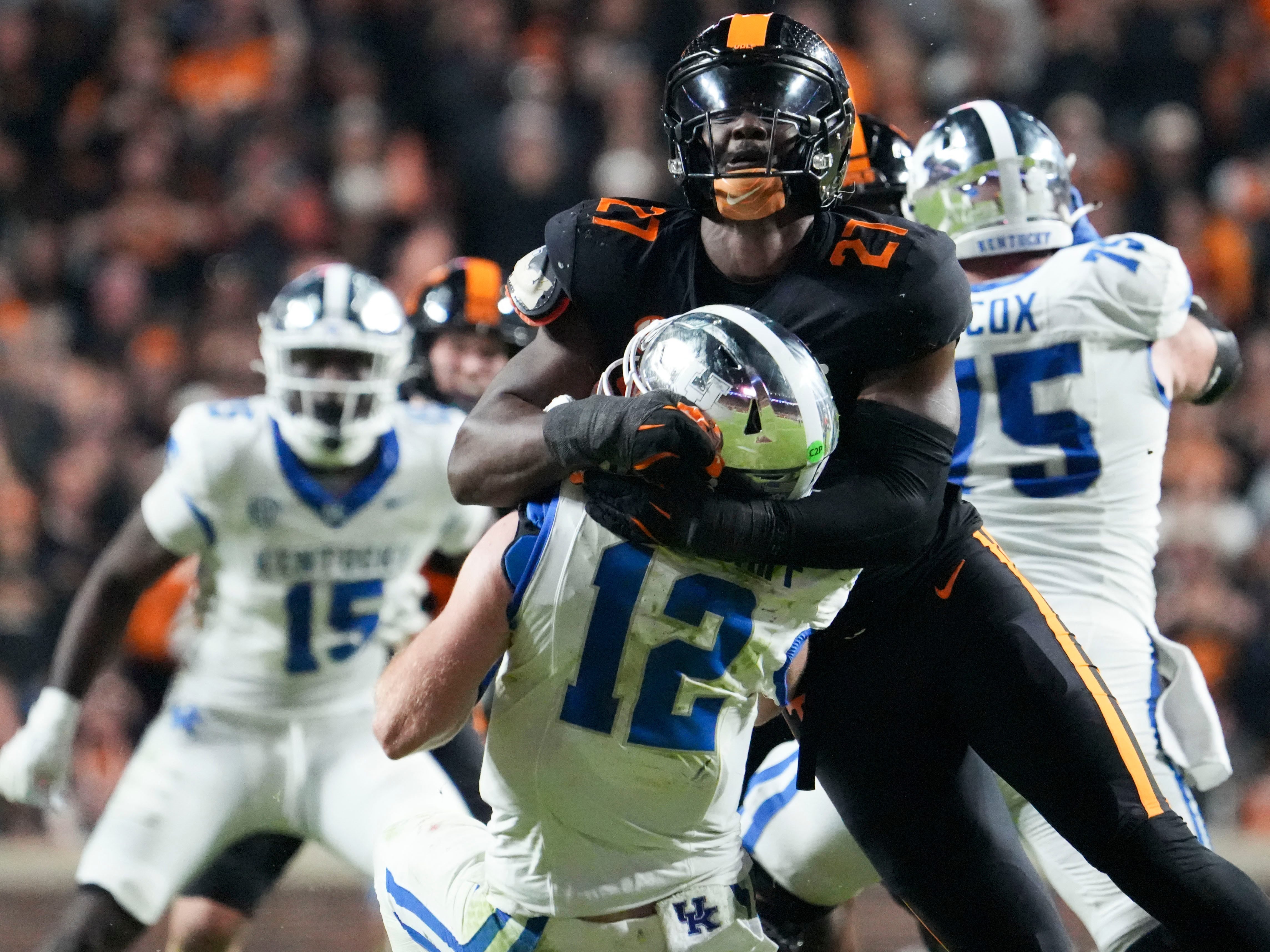 Nov 2, 2024; Knoxville, Tennessee, USA; Tennessee Volunteers defensive lineman James Pearce Jr. (27) takes down Kentucky Wildcats quarterback Brock Vandagriff (12) during the second half at Neyland Stadium.