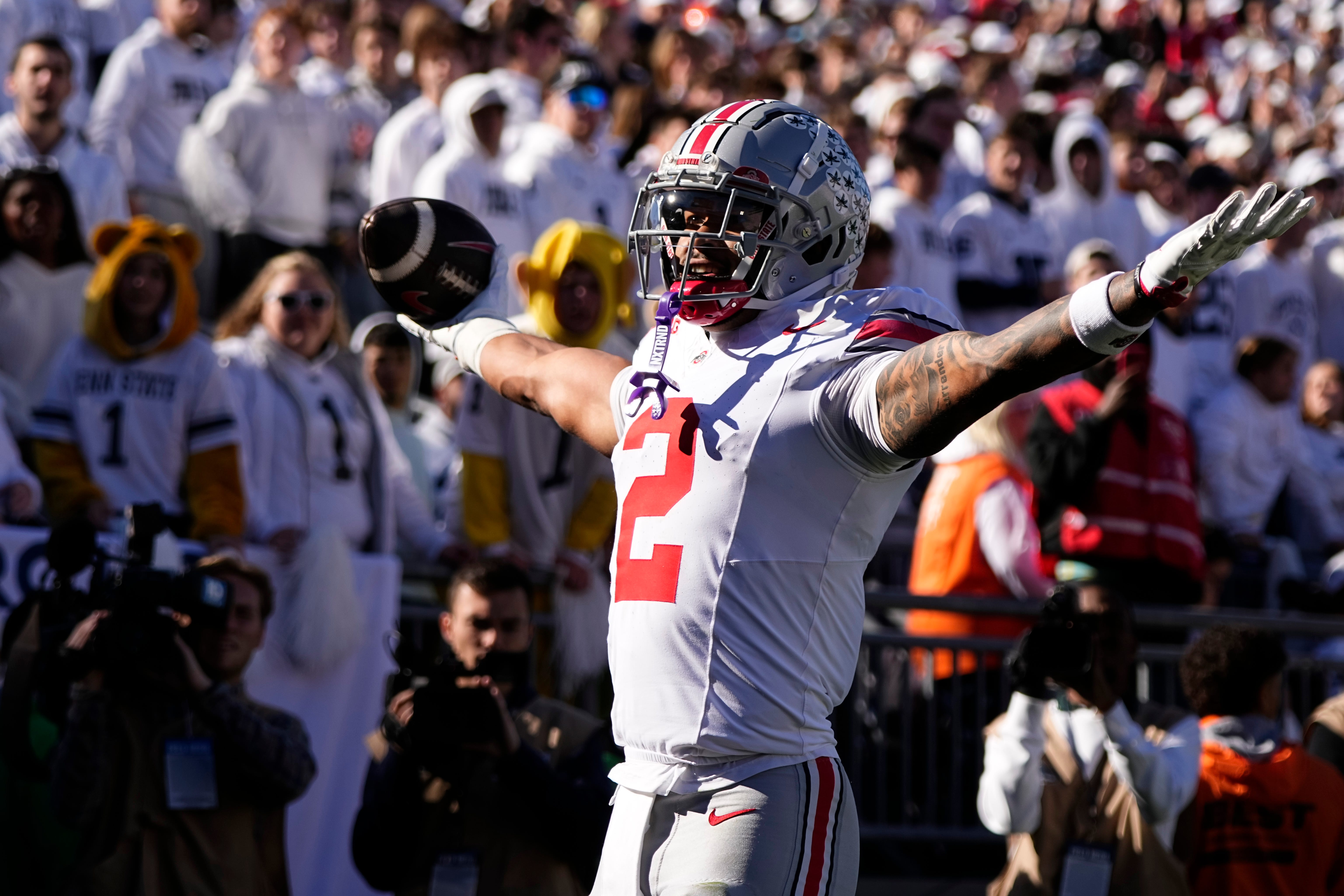 Ohio State Buckeyes wide receiver Emeka Egbuka (2) celebrates a touchdown during the first half of the NCAA football game against the Penn State Nittany Lions at Beaver Stadium in University Park, Pa. on Saturday, Nov. 2, 2024.