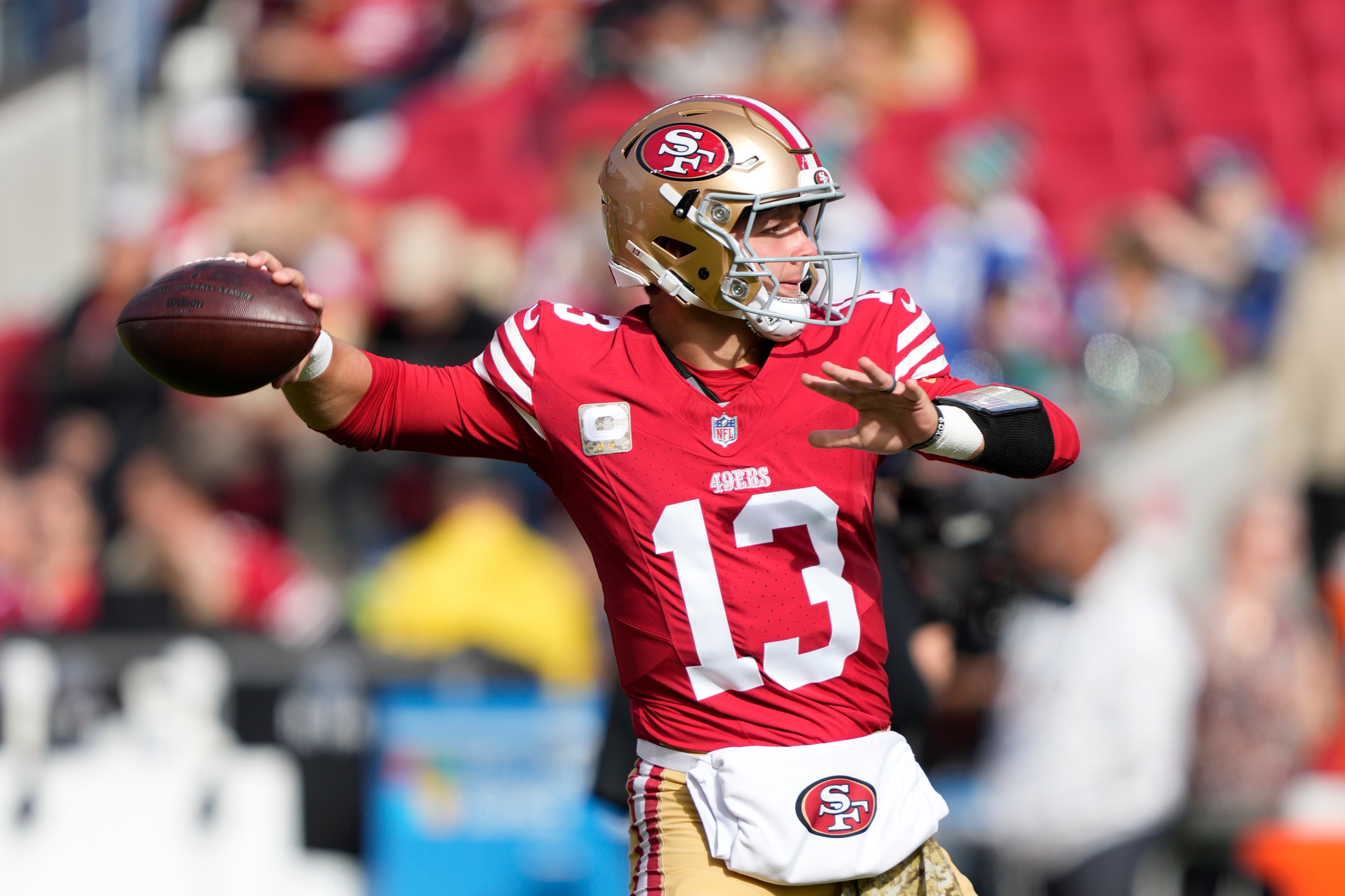 San Francisco 49ers quarterback Brock Purdy (13) warms up before the game against the Seattle Seahawks at Levi's Stadium.