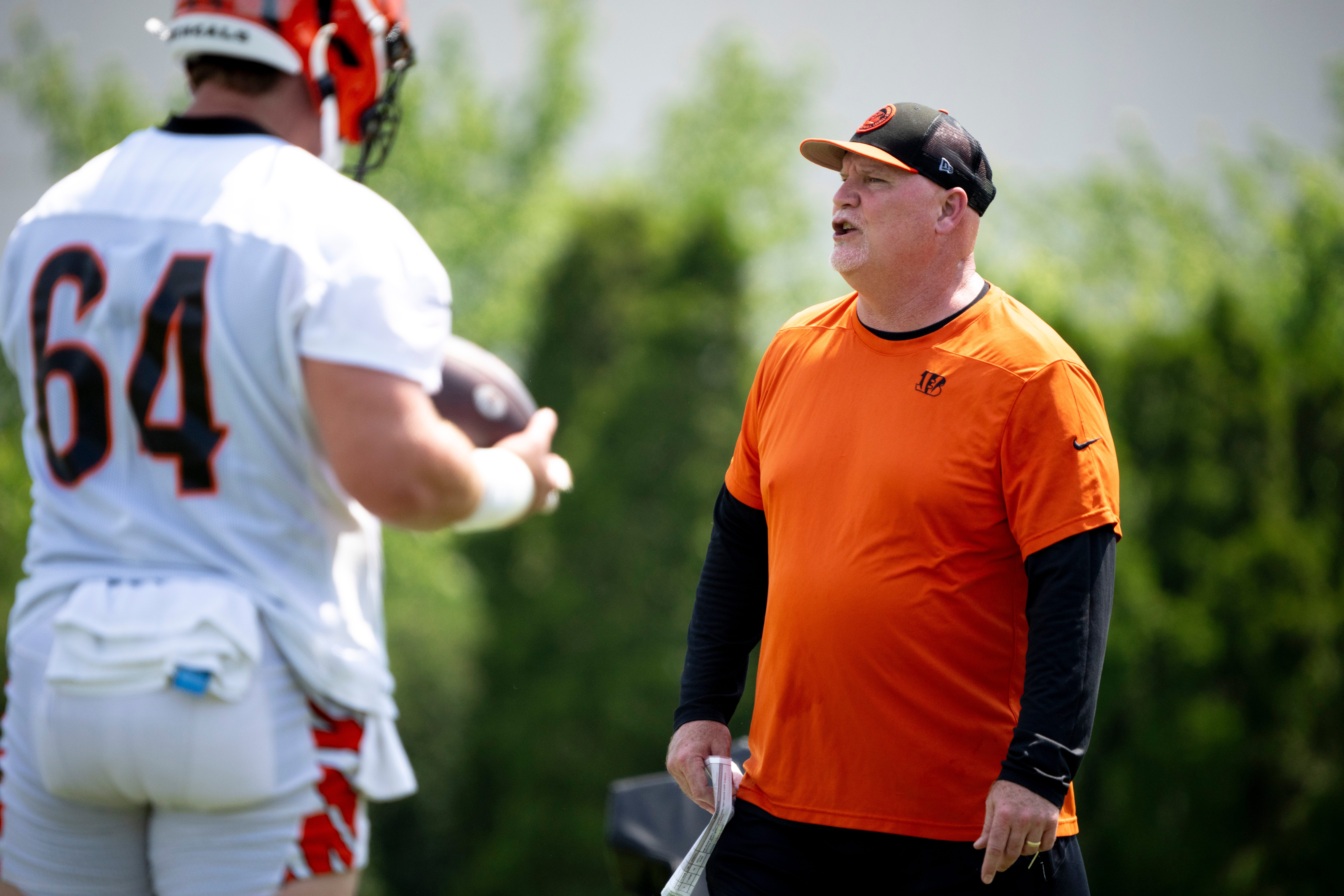 Cincinnati Bengals offensive line coach Frank Pollack coaches at the Bengals NFL practice in Cincinnati on Tuesday, June 4, 2024.