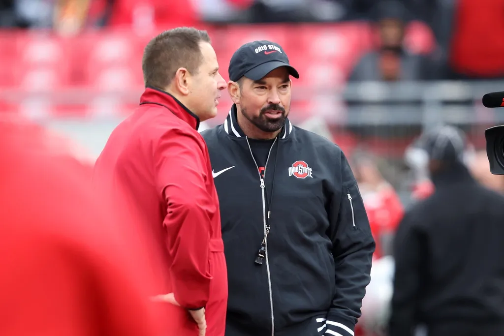 Ohio State Buckeyes head coach Ryan Day(right) and Indiana Hoosiers head coach Curt Cignetti meet at midfield before the game at Ohio Stadium.