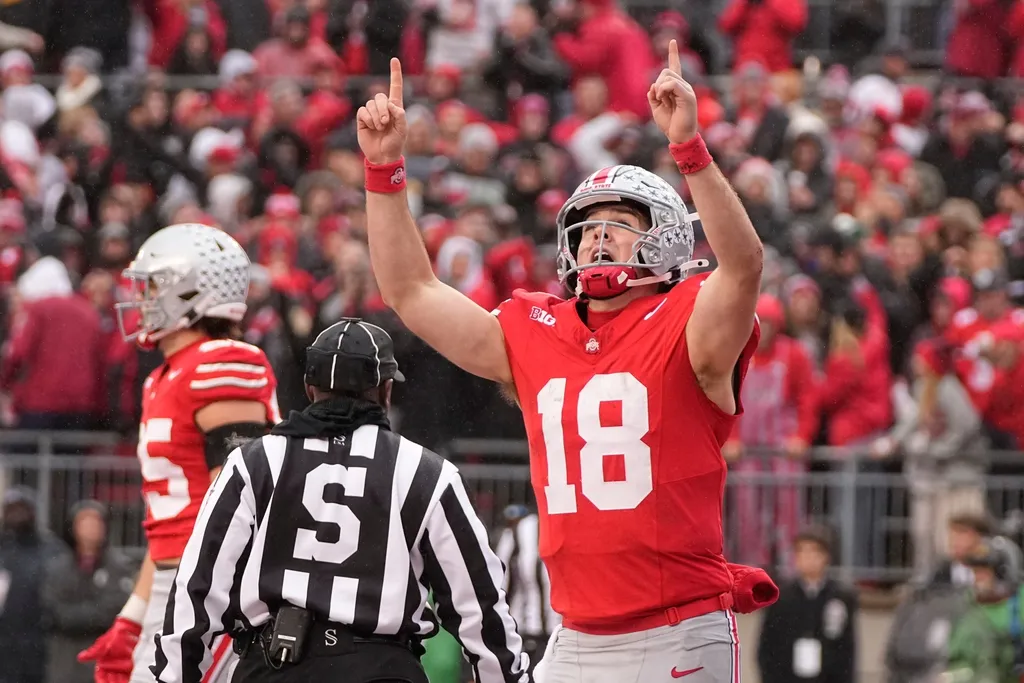 Ohio State Buckeyes quarterback Will Howard (18) celebrates a touchdown during the first half of the NCAA football game against the Indiana Hoosiers at Ohio Stadium in Columbus on Saturday