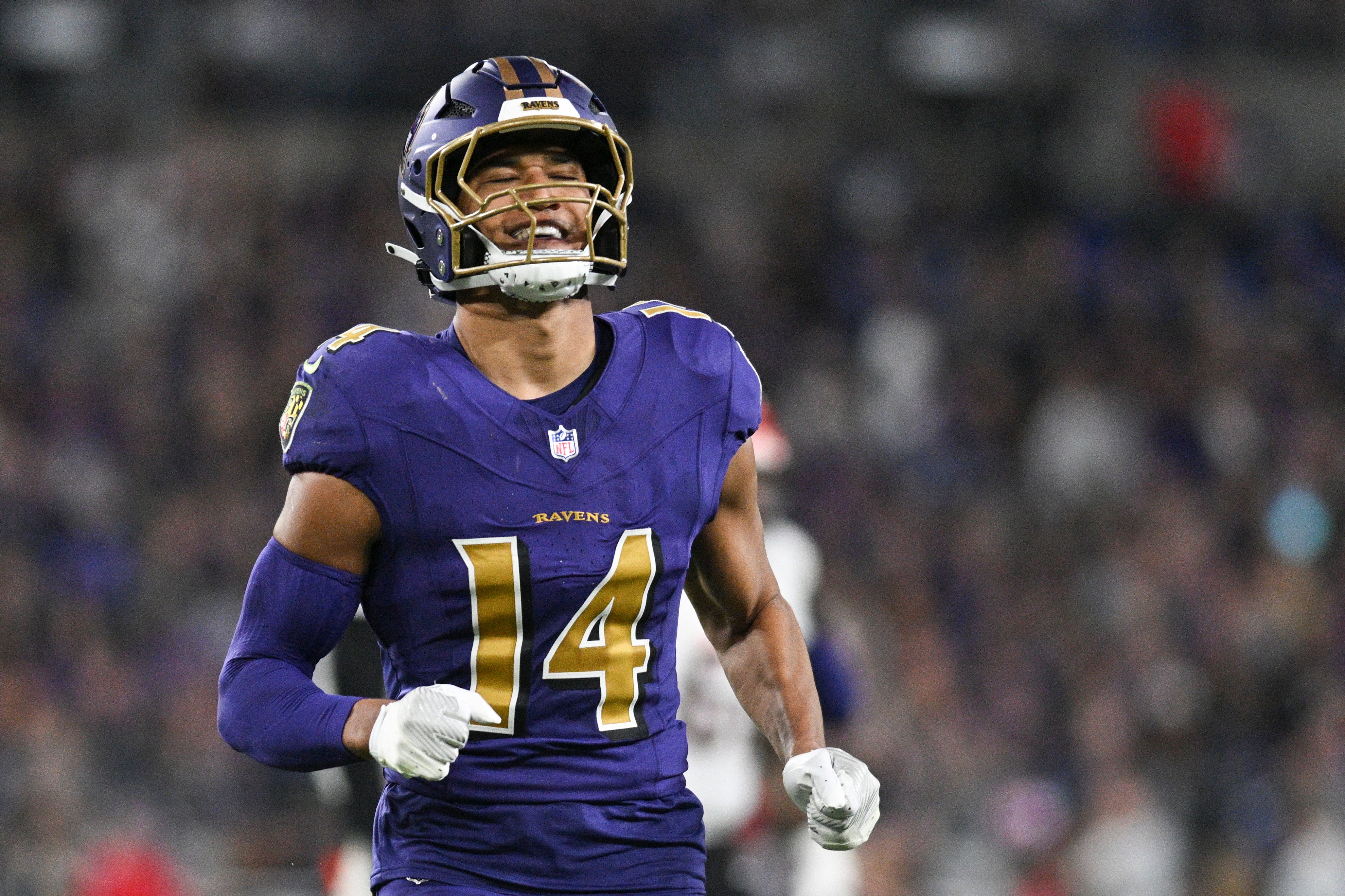 Nov 7, 2024; Baltimore, Maryland, USA; Baltimore Ravens safety Kyle Hamilton (14) reacts after tips a Cincinnati Bengals quarterback Joe Burrow (9) pass during the first quarter at M&T Bank Stadium.