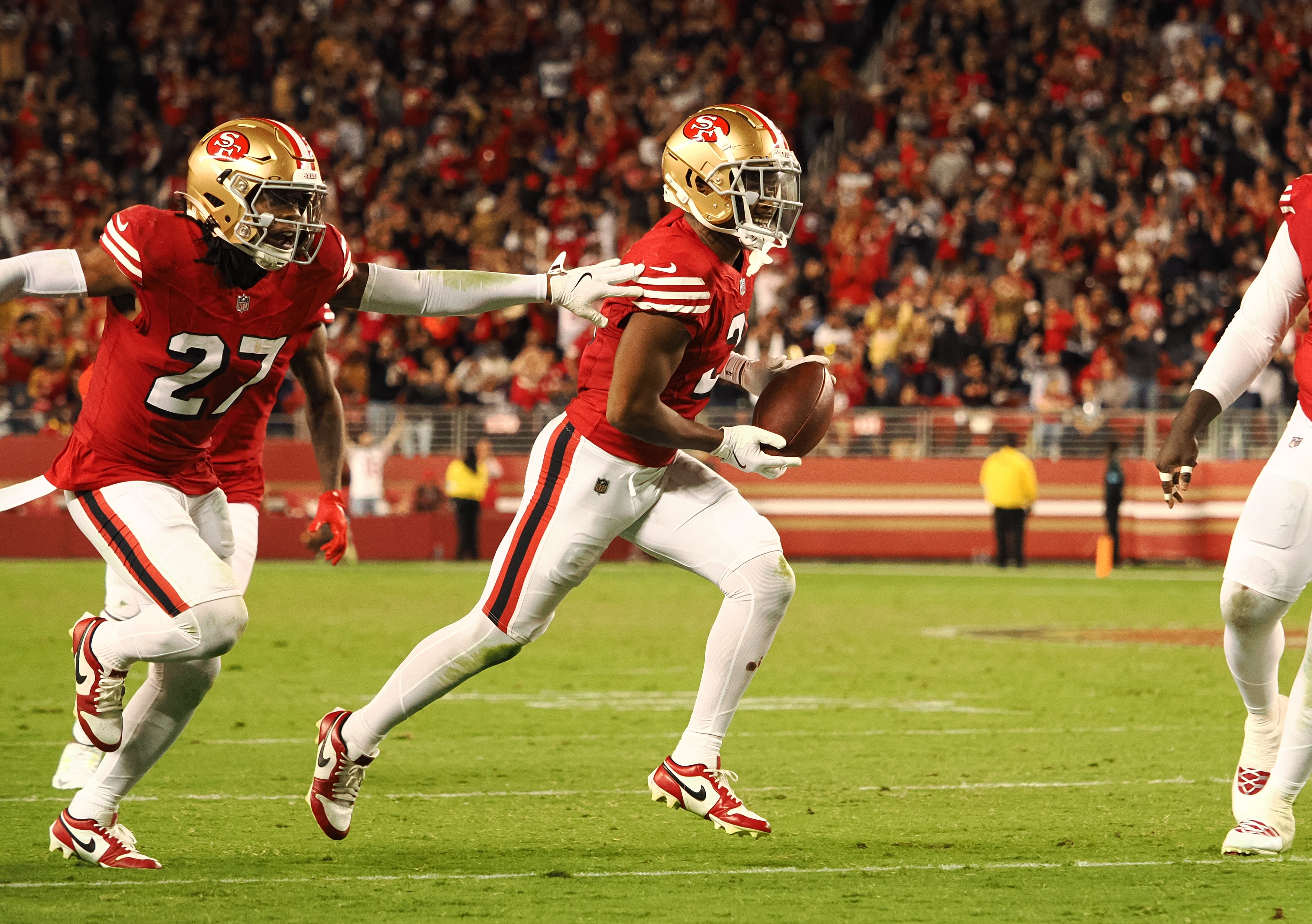 San Francisco 49ers defensive back Deommodore Lenoir (2) celebrates after an interception against the Dallas Cowboys during the third quarter at Levi's Stadium.