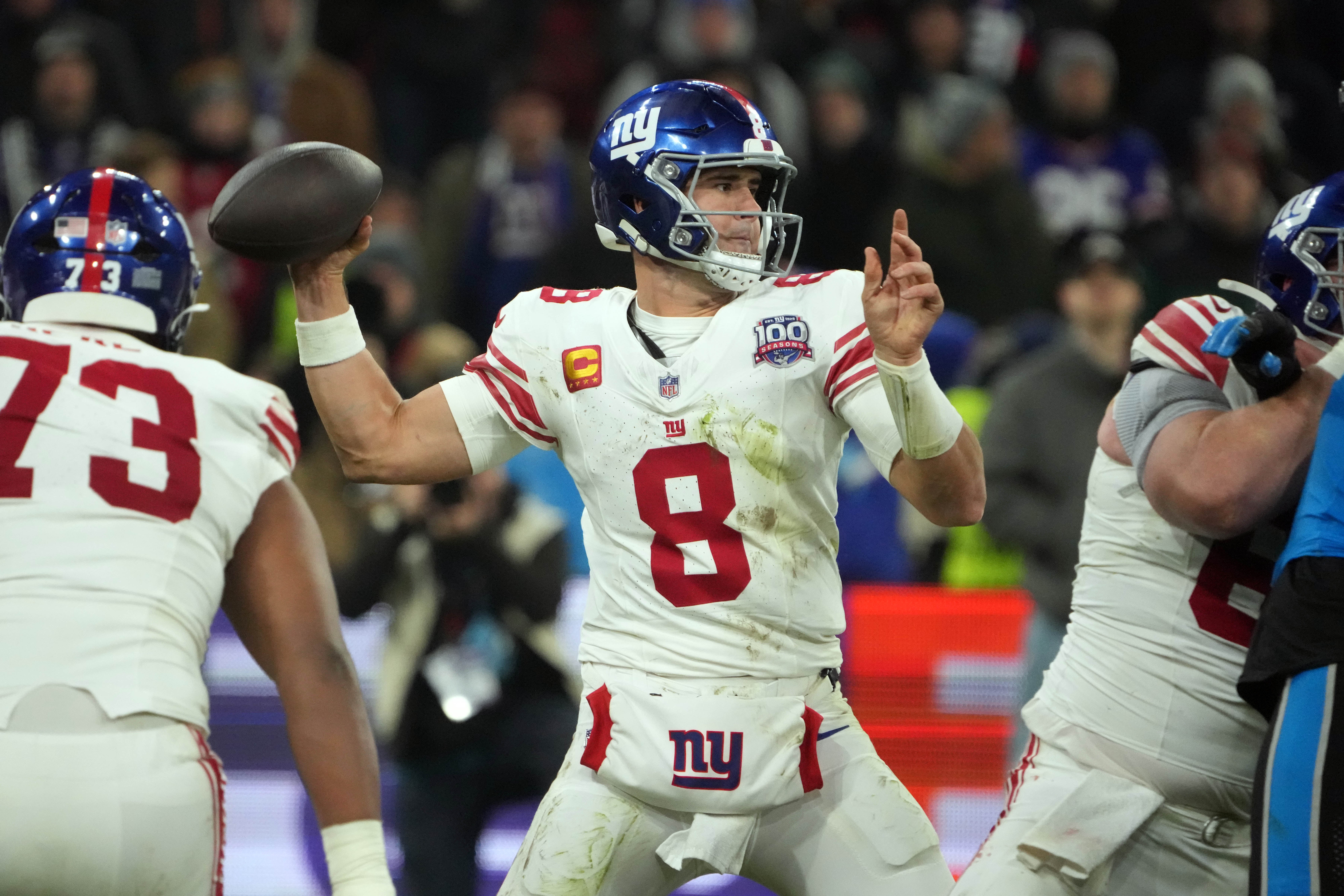 Nov 10, 2024; Munich, Germany; New York Giants quarterback Daniel Jones (8) throws the ball against the Carolina Panthers in the second half during the 2024 NFL Munich Game at Allianz Arena.