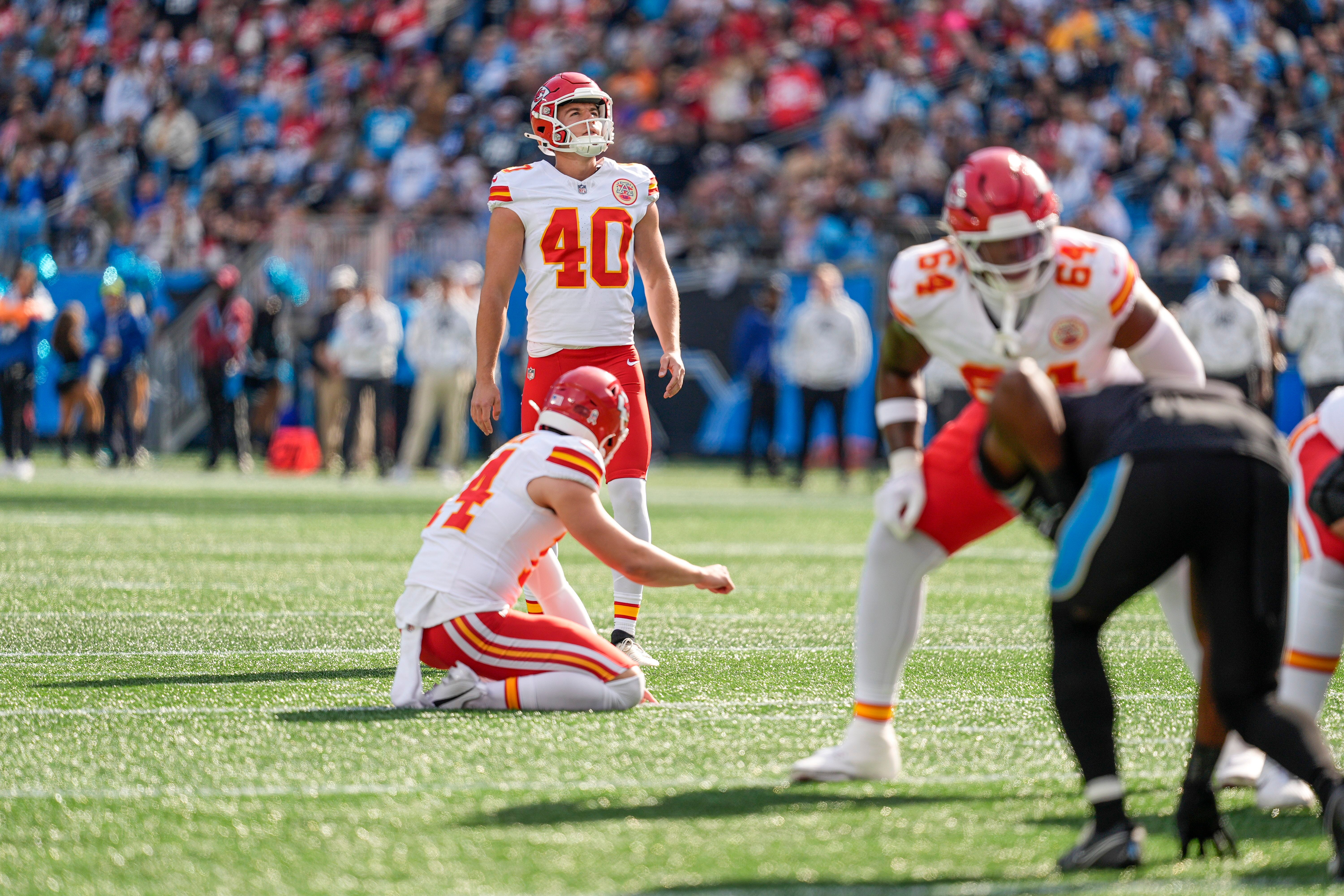 Nov 24, 2024; Charlotte, North Carolina, USA; Kansas City Chiefs place kicker Spencer Shrader (40) looks towards the goal post during a field goal attempt during the first quarter against the Carolina Panthers at Bank of America Stadium.