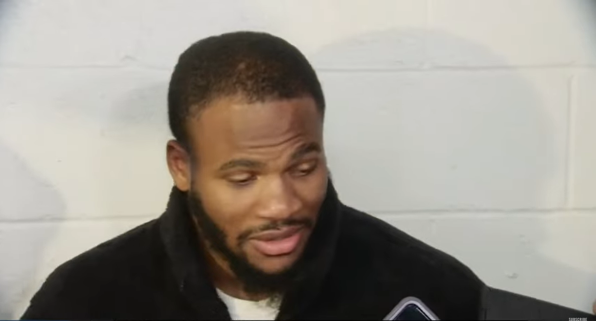 Dallas Cowboys DE Micah Parsons talks to reporters following win over Washington Commanders in Week 12.