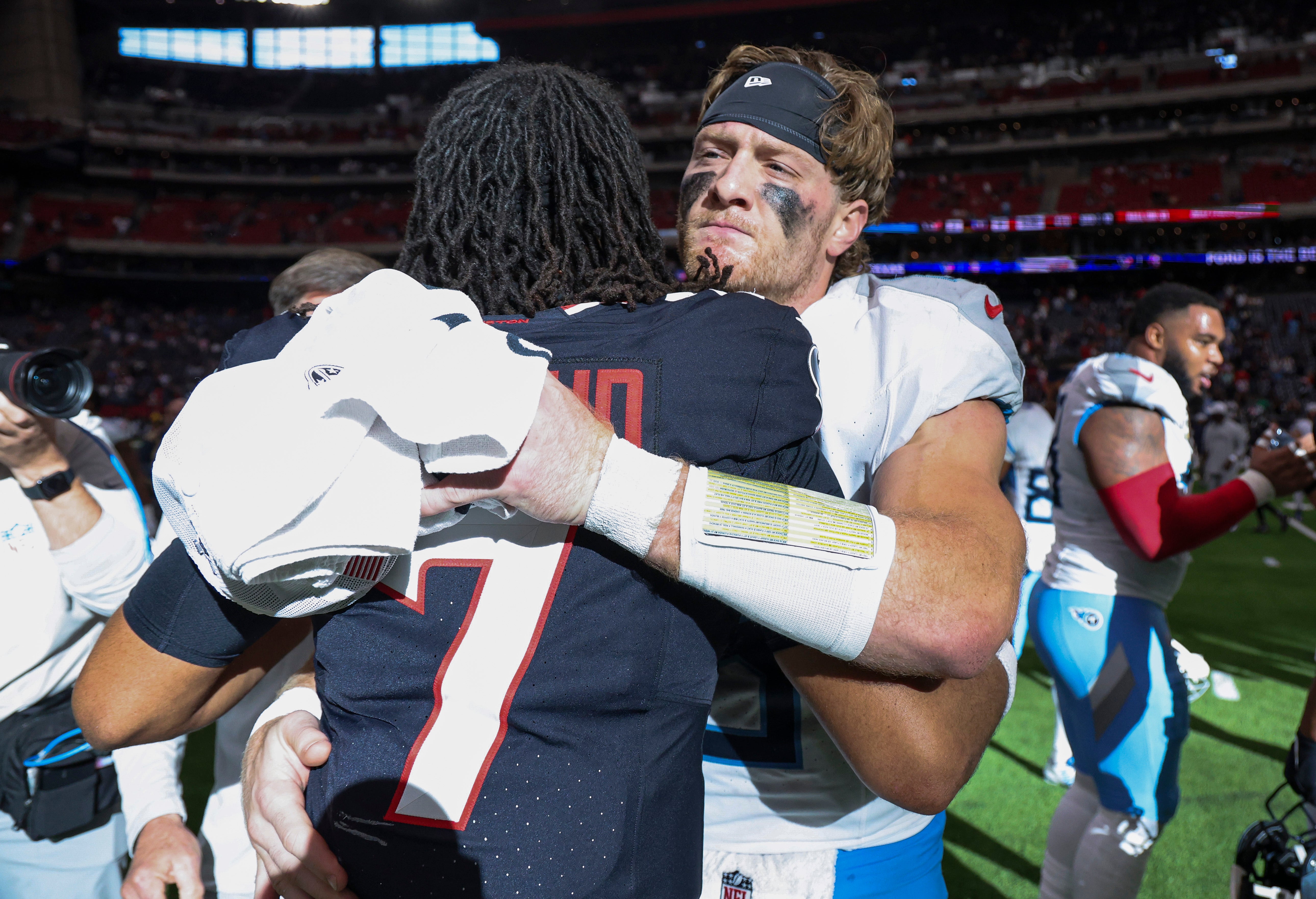 Tennessee Titans quarterback Will Levis (8) greets Houston Texans quarterback C.J. Stroud (7) on the field after the game at NRG Stadium. Troy Taormina-Imagn Images