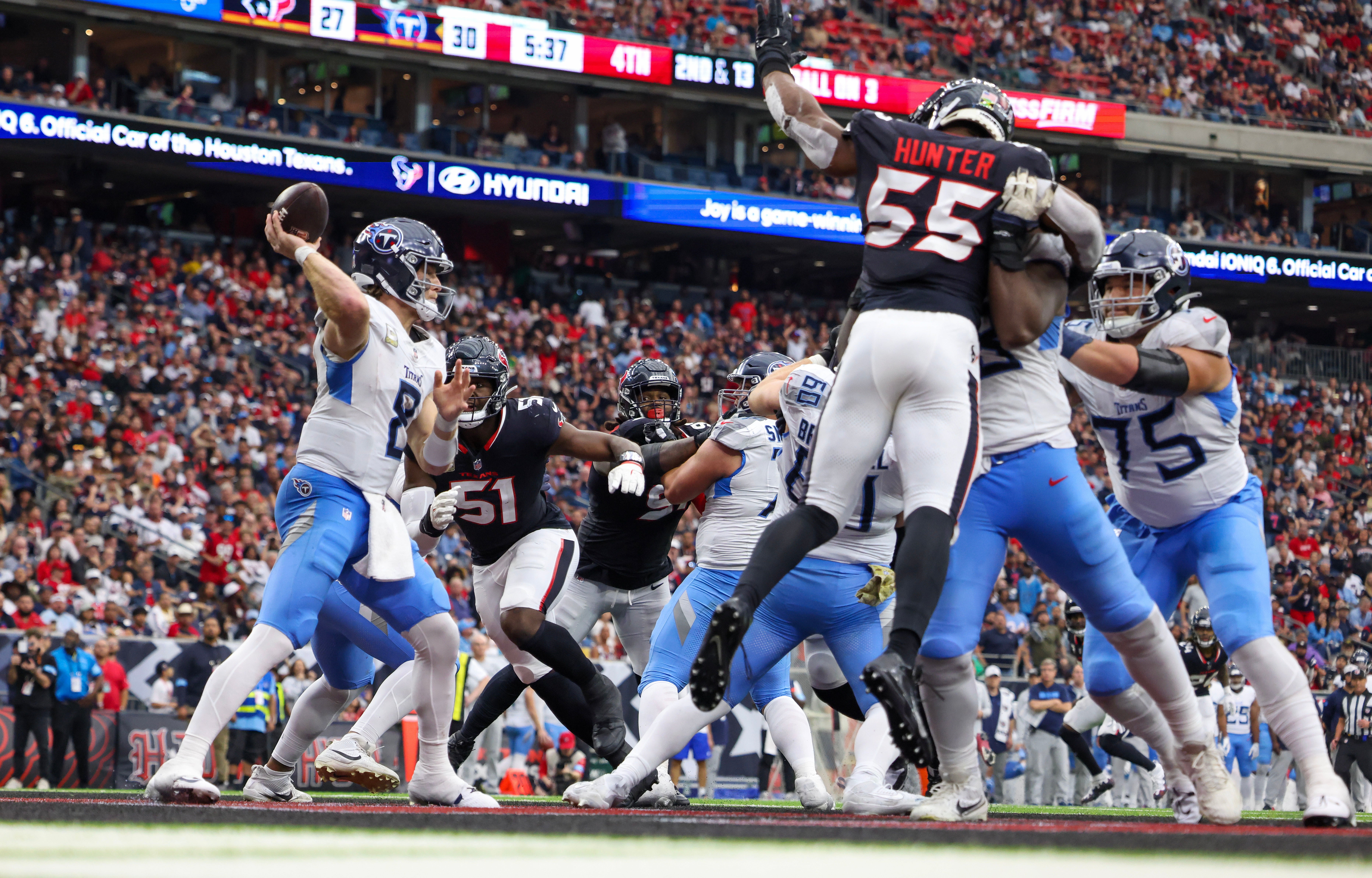 Tennessee Titans quarterback Will Levis (8) drops back to pass against Houston Texans defensive end Will Anderson Jr. (51) in the fourth quarter at NRG Stadium. Thomas Shea-Imagn Images