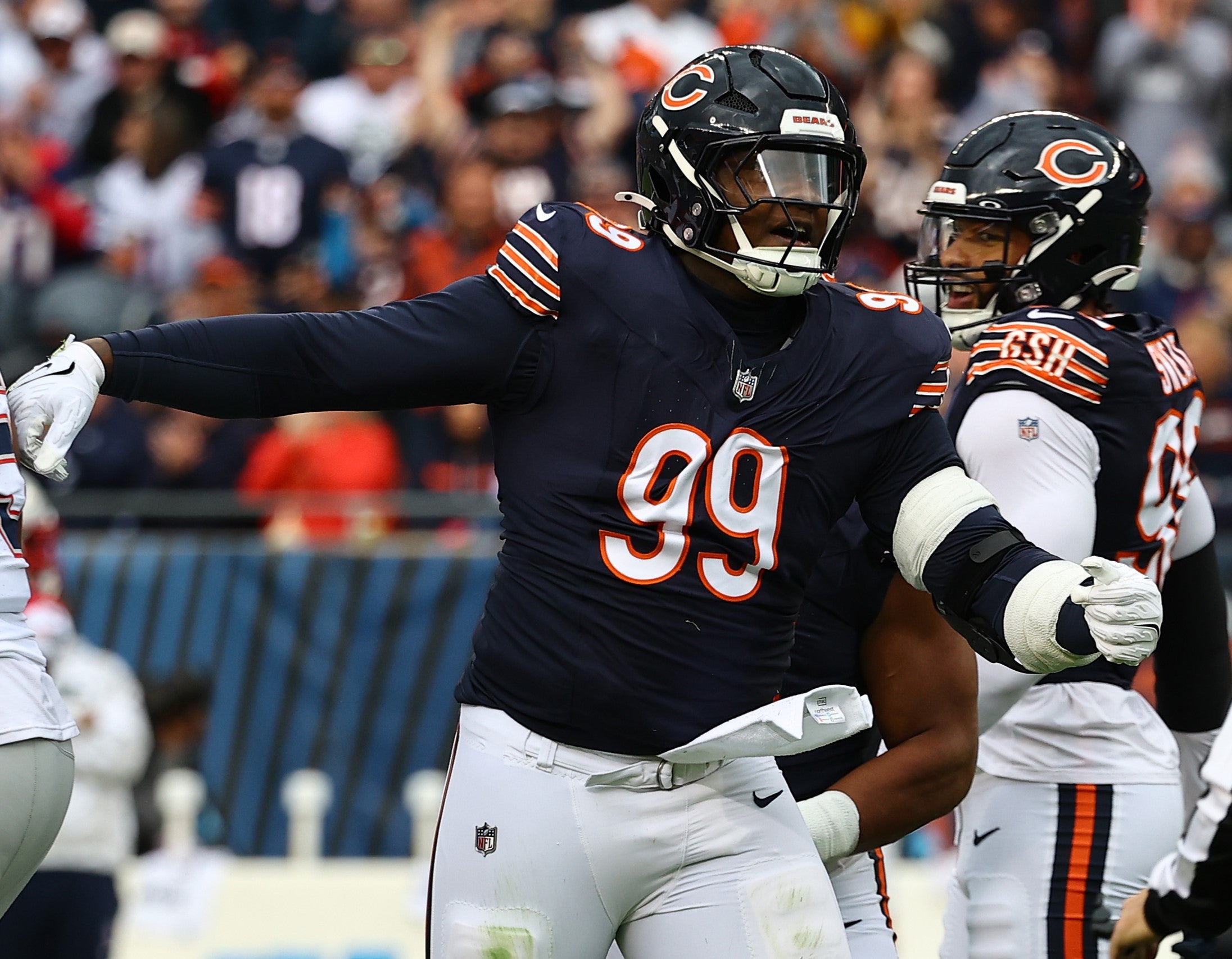 Nov 10, 2024; Chicago, Illinois, USA; Chicago Bears defensive tackle Gervon Dexter Sr. (99) reacts against the New England Patriots during the first quarter at Soldier Field.