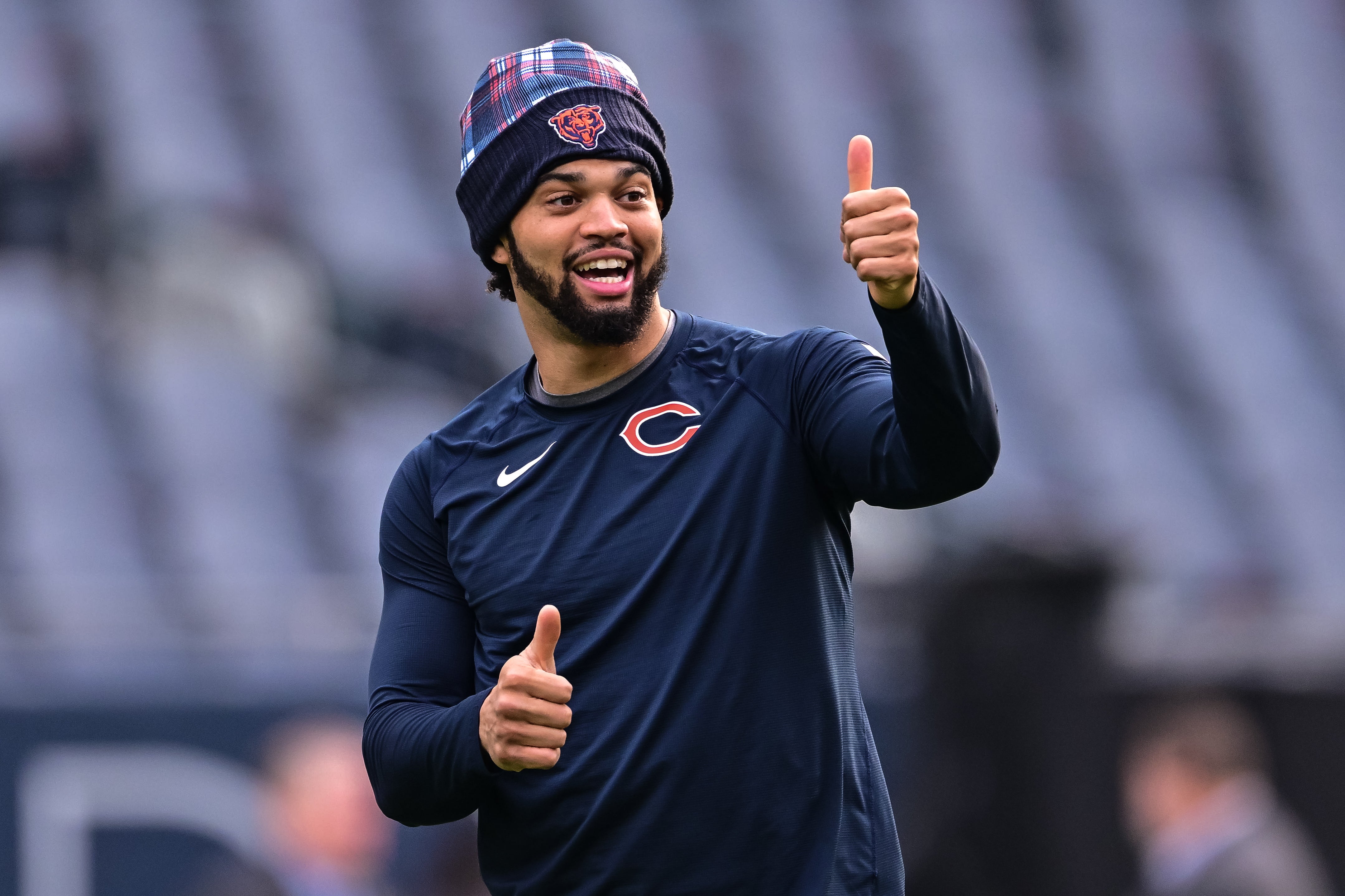 Nov 17, 2024; Chicago, Illinois, USA; Chicago Bears quarterback Caleb Williams (18) warms up before the game against the Green Bay Packers at Soldier Field.