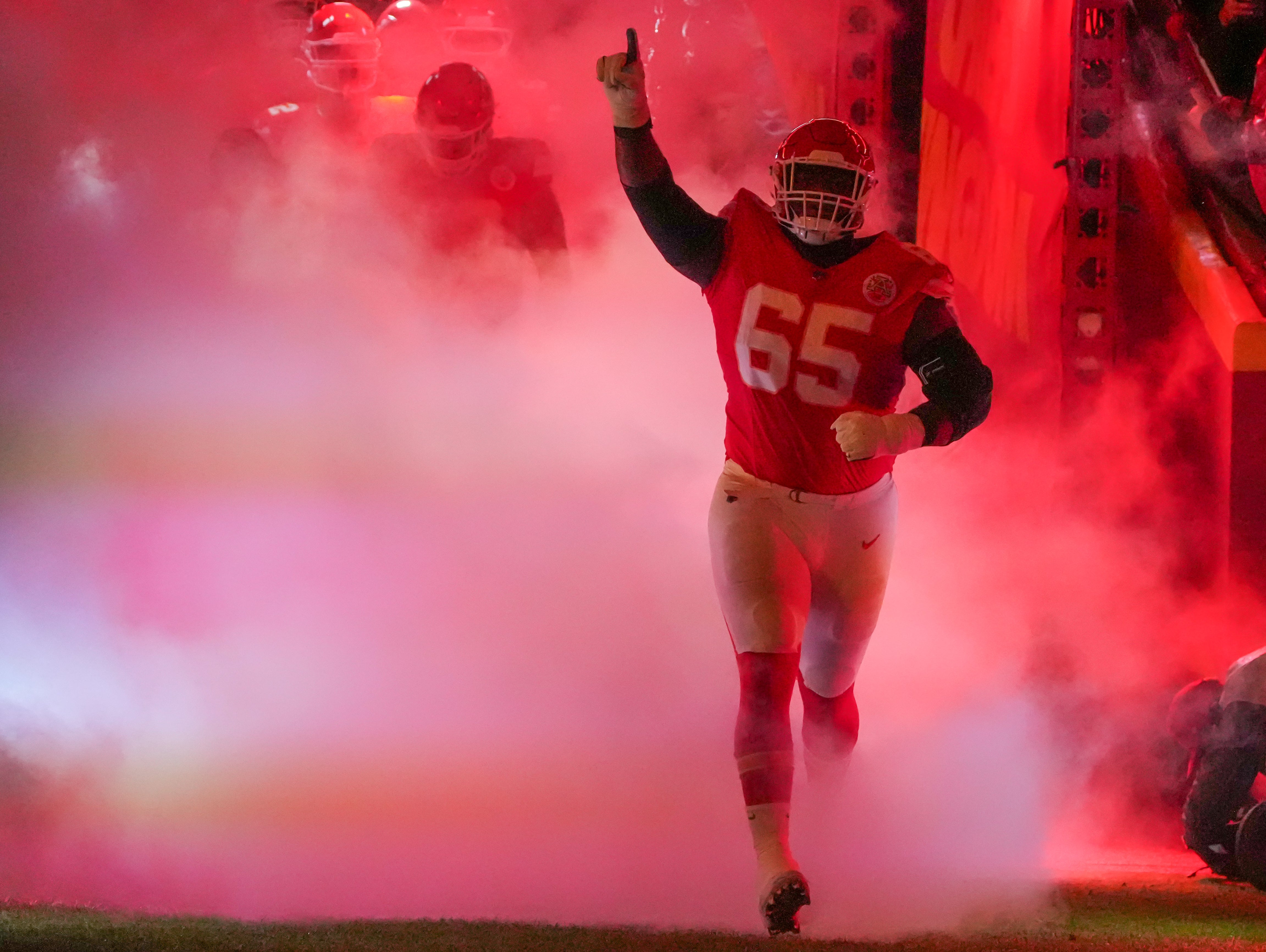 Nov 4, 2024; Kansas City, Missouri, USA; Kansas City Chiefs guard Trey Smith (65) is introduced against the Tampa Bay Buccaneers prior to a game at GEHA Field at Arrowhead Stadium.