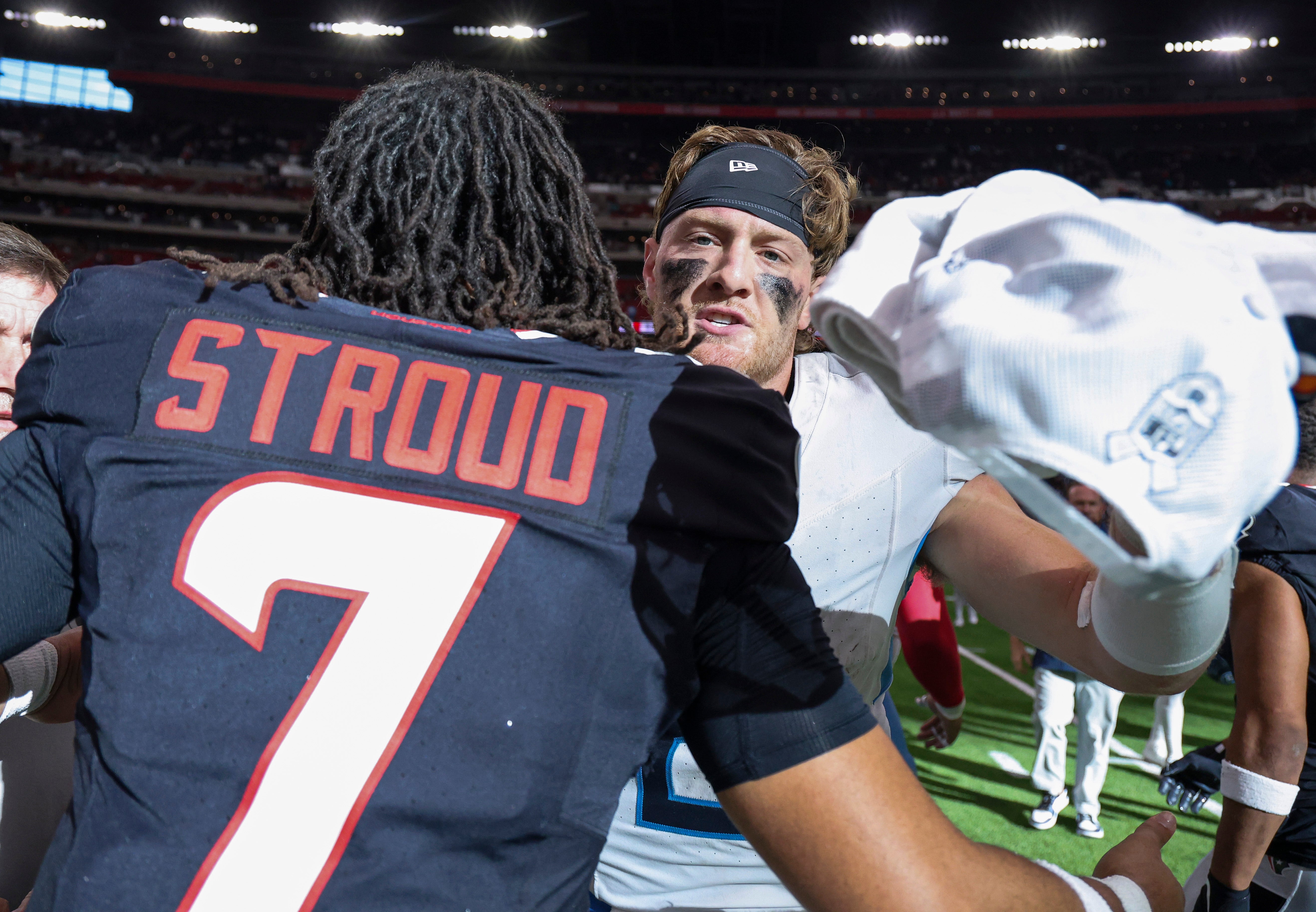 Nov 24, 2024; Houston, Texas, USA; Tennessee Titans quarterback Will Levis (8) greets Houston Texans quarterback C.J. Stroud (7) on the field after the game at NRG Stadium. Mandatory Credit: Troy Taormina-Imagn Images