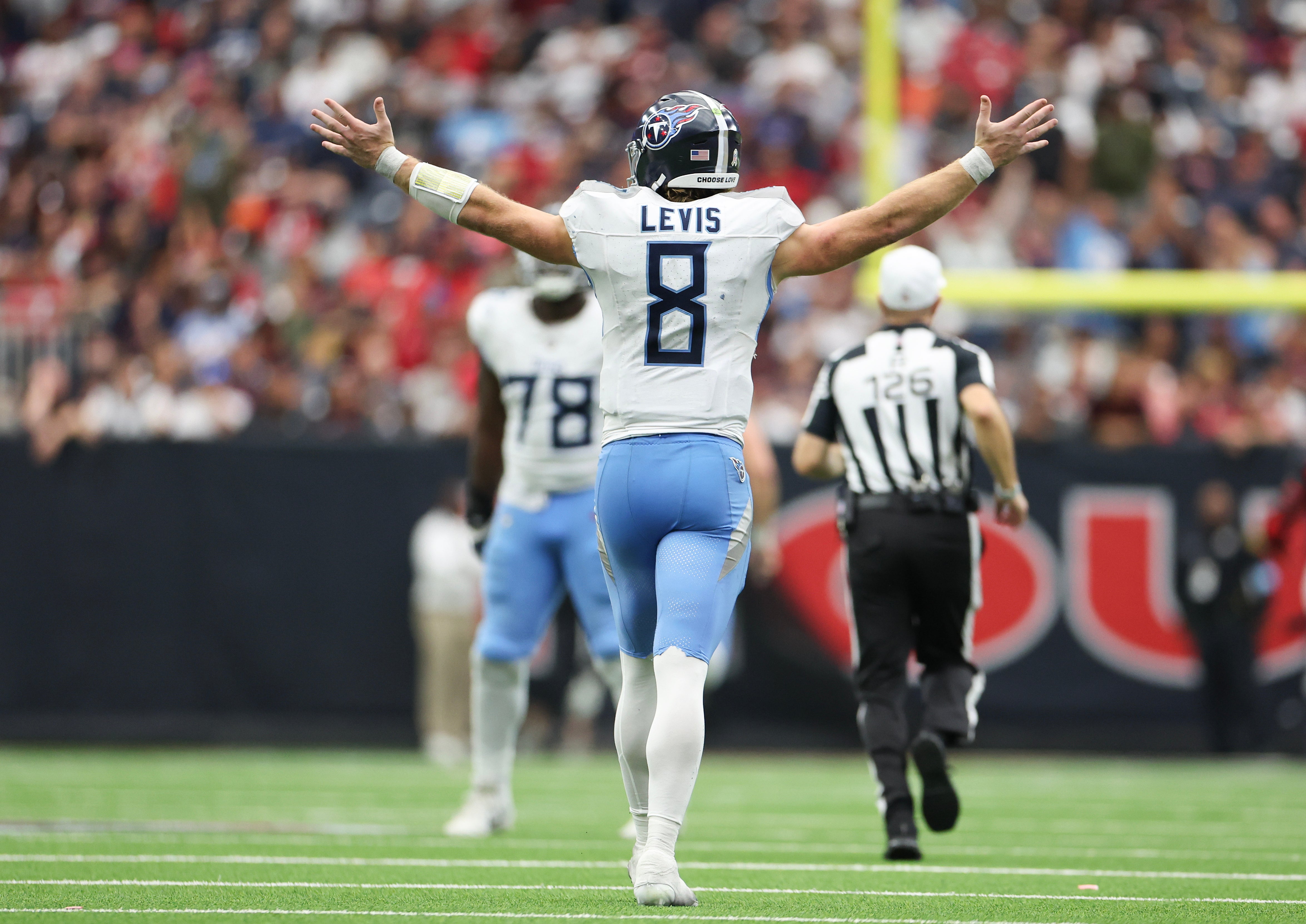 Tennessee Titans quarterback Will Levis (8) celebrates his 70 yard touchdown pass against the Houston Texans in the fourth quarter at NRG Stadium. Thomas Shea-Imagn Images