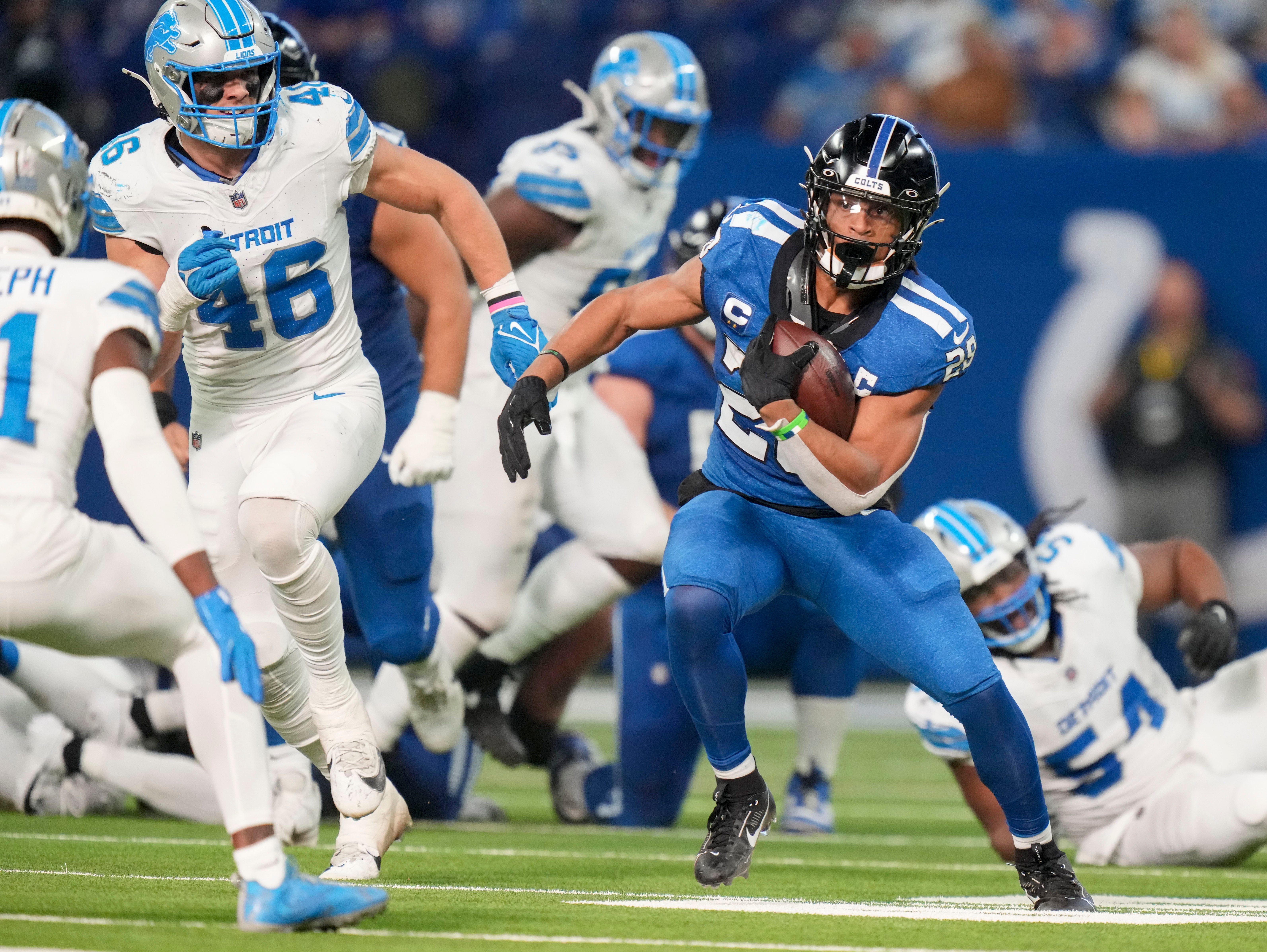 Indianapolis Colts running back Jonathan Taylor (28) rushes the ball Sunday, Nov. 24, 2024, during a game against the Detroit Lions at Lucas Oil Stadium in Indianapolis.