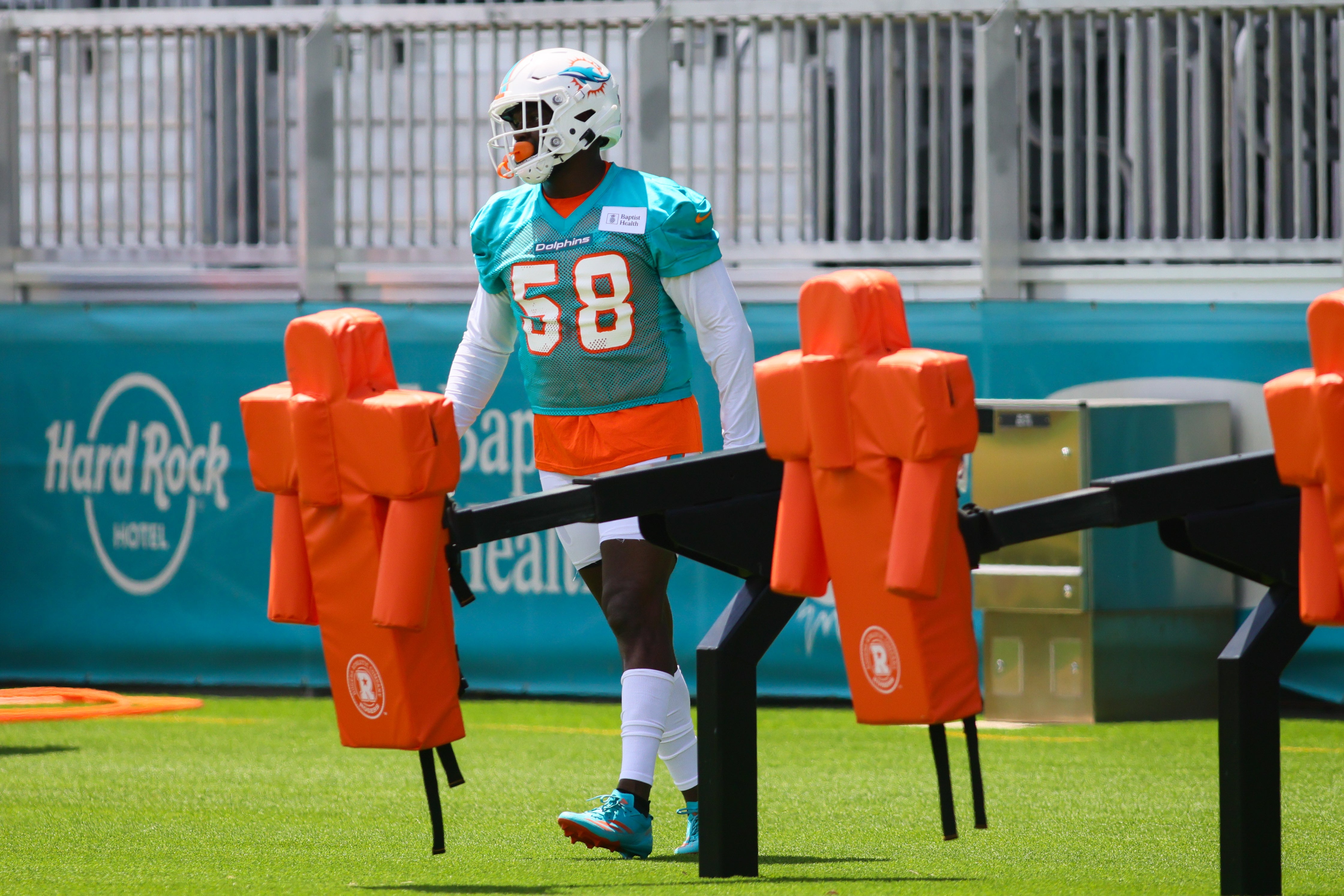Jun 4, 2024; Miami Gardens, FL, USA; Miami Dolphins linebacker Shaquil Barrett (58) works out during mandatory minicamp at Baptist Health Training Complex.