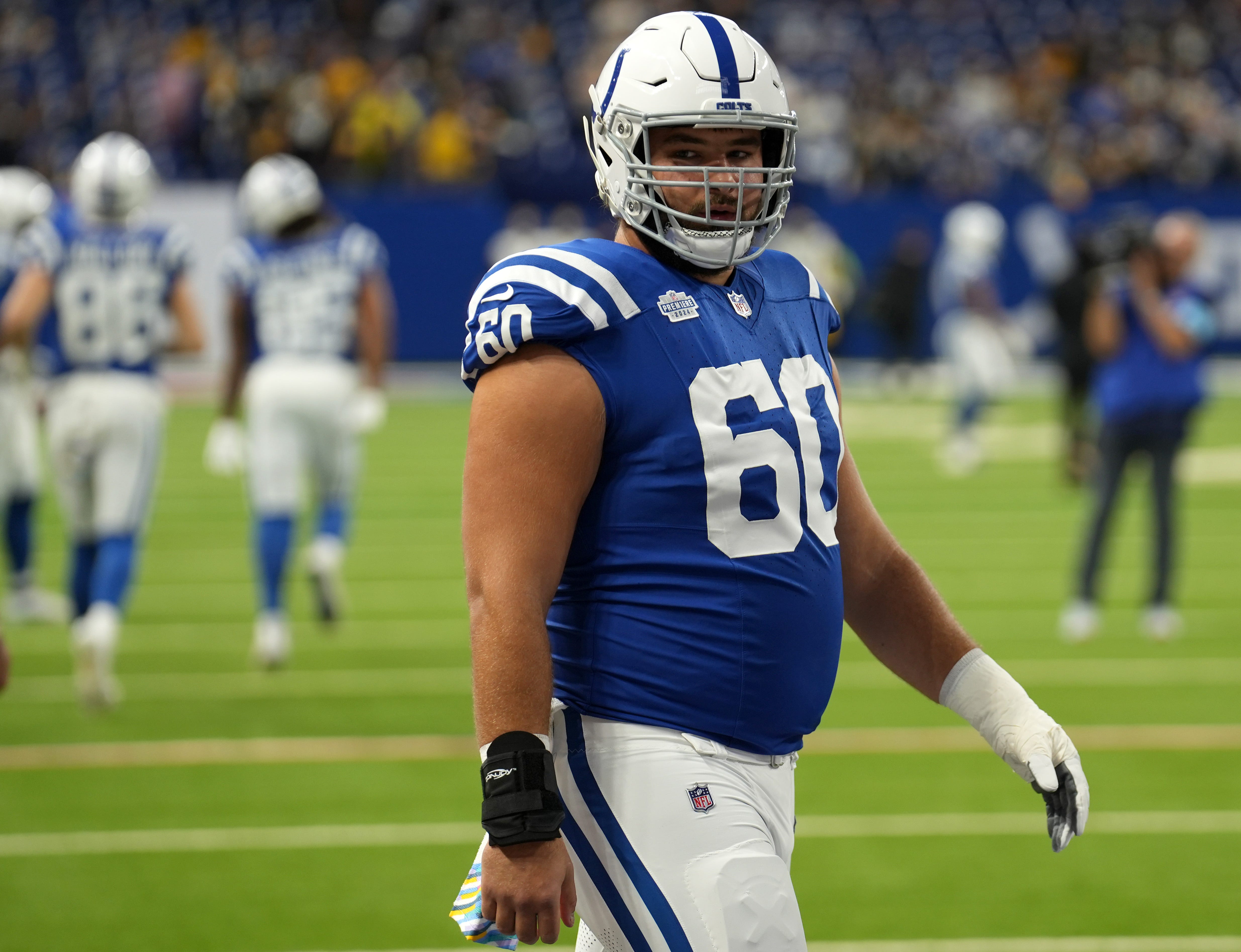 Indianapolis Colts guard Tanor Bortolini (60) warms up before an Indianapolis Colts game against the Pittsburgh Steelers on Sunday, Sept. 29, 2024, at Lucas Oil Stadium in downtown Indianapolis.