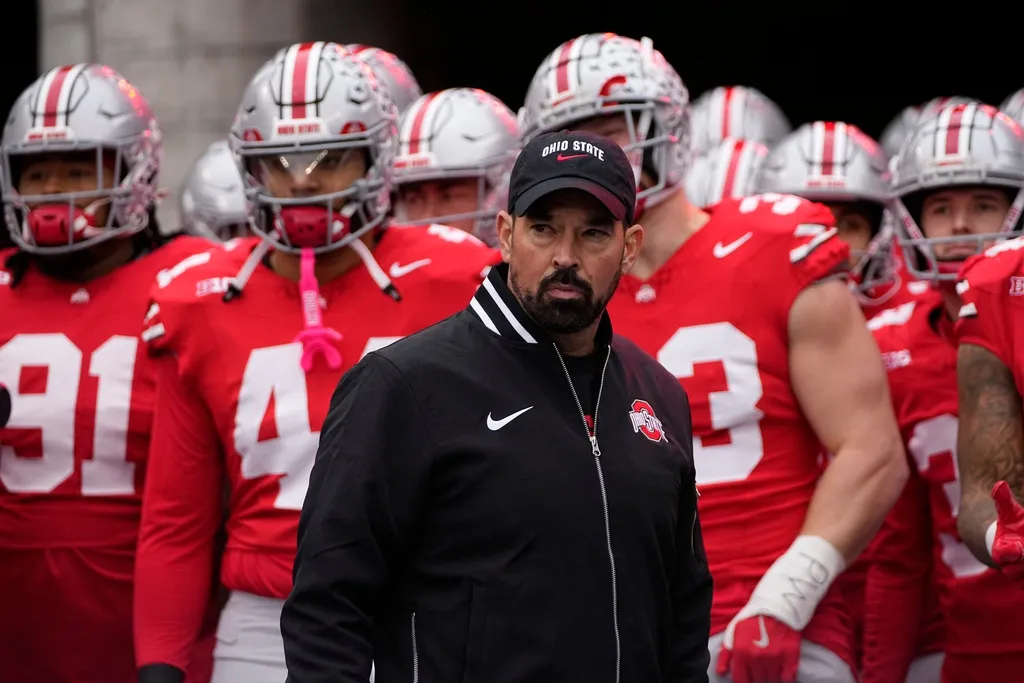 Ohio State Buckeyes head coach Ryan Day prepares to lead his team onto the field for the NCAA football game against the Indiana Hoosiers at Ohio Stadium in Columbus on Saturday, Nov. 23, 2024