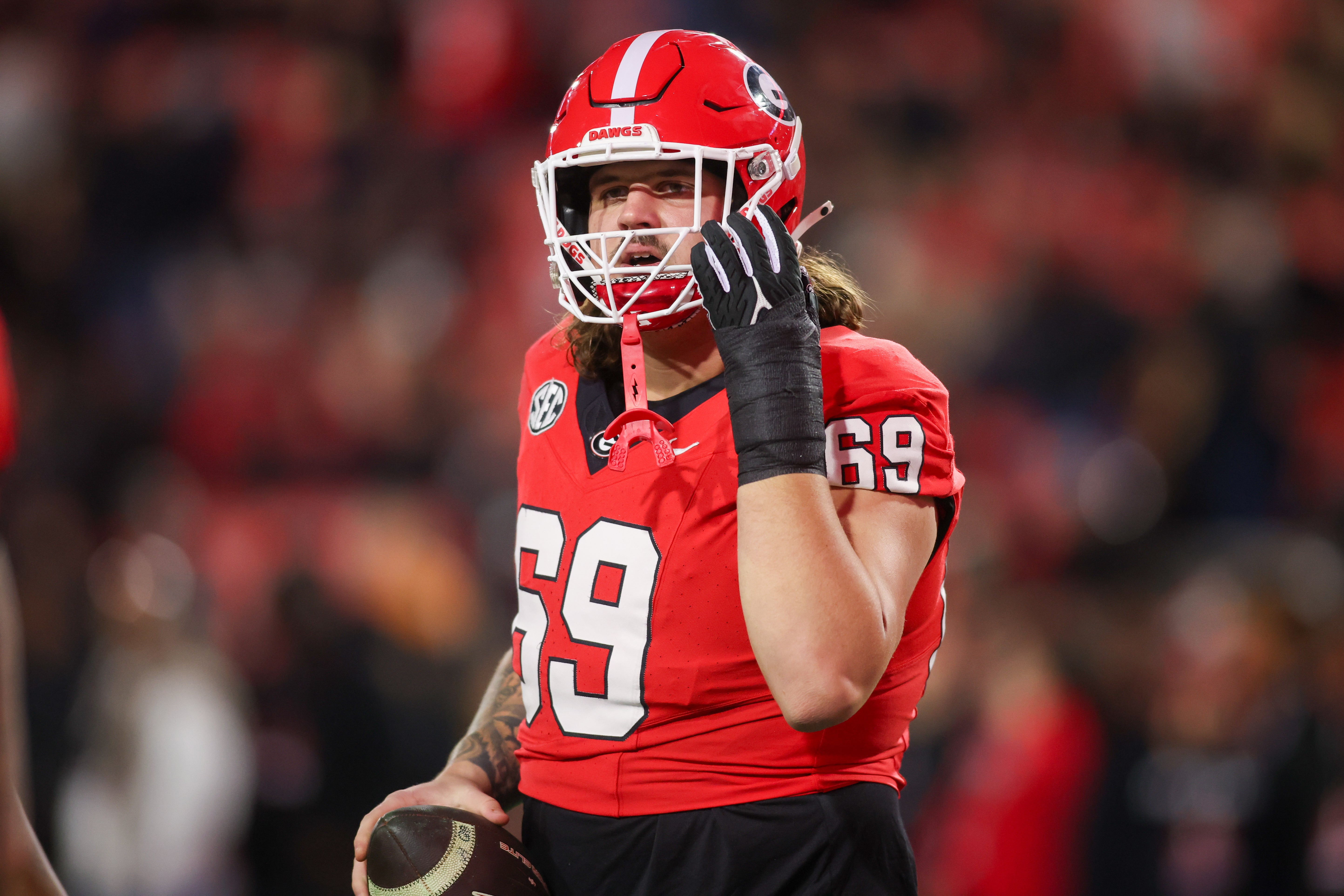 Georgia Bulldogs offensive lineman Tate Ratledge (69) prepares for a game against the Tennessee Volunteers at Sanford Stadium.