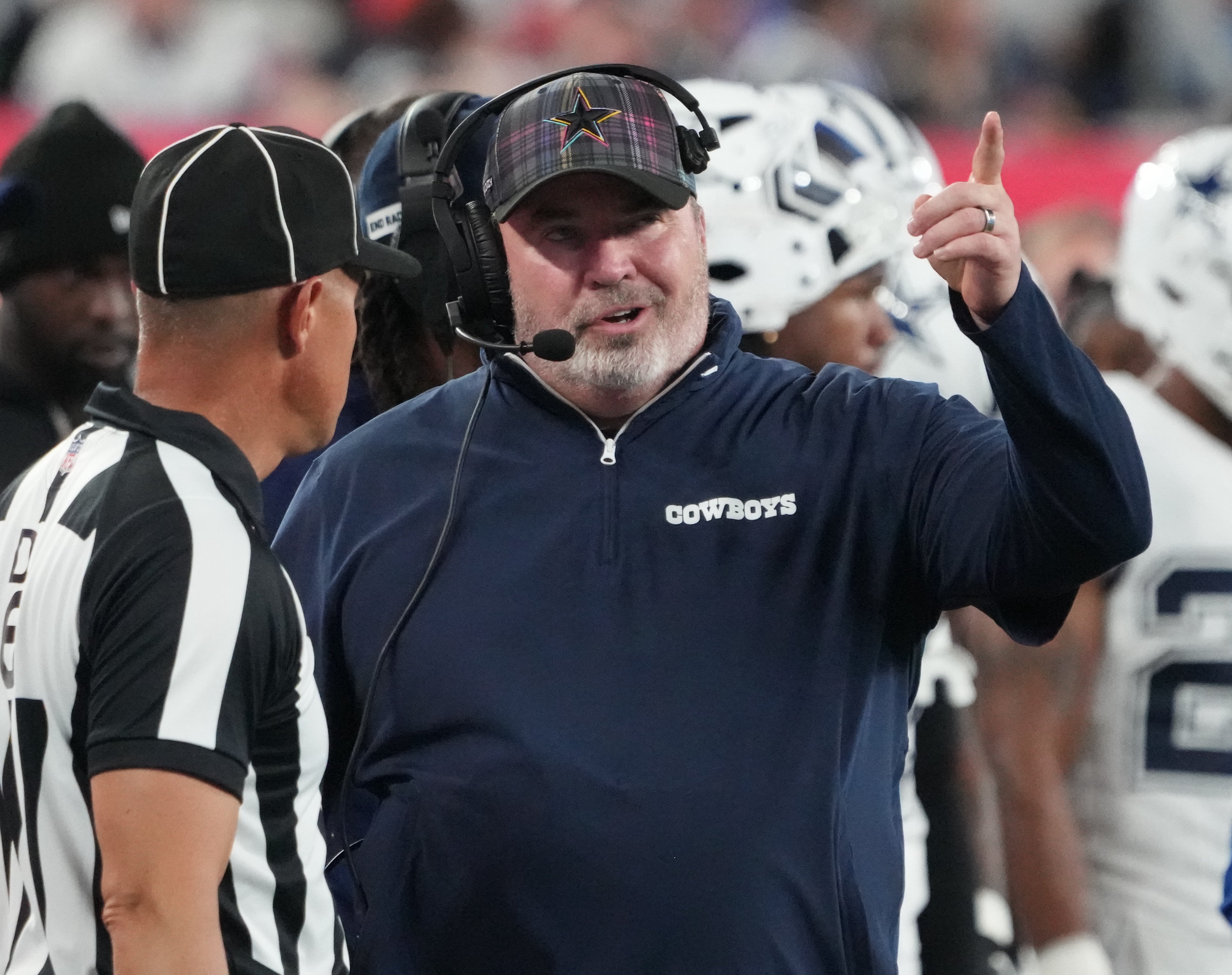 Dallas Cowboys head coach Mike McCarthy speaks with a referee against the New York Giants at MetLife Stadium.