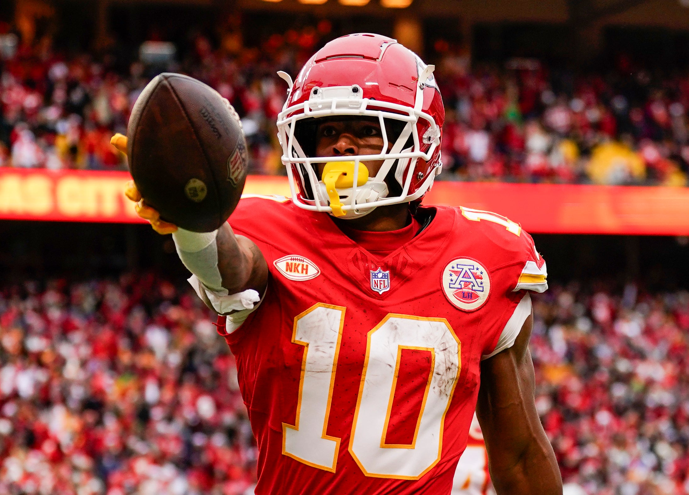 Dec 25, 2023; Kansas City, Missouri, USA; Kansas City Chiefs running back Isiah Pacheco (10) scores a touchdown during the first half against the Las Vegas Raiders at GEHA Field at Arrowhead Stadium.