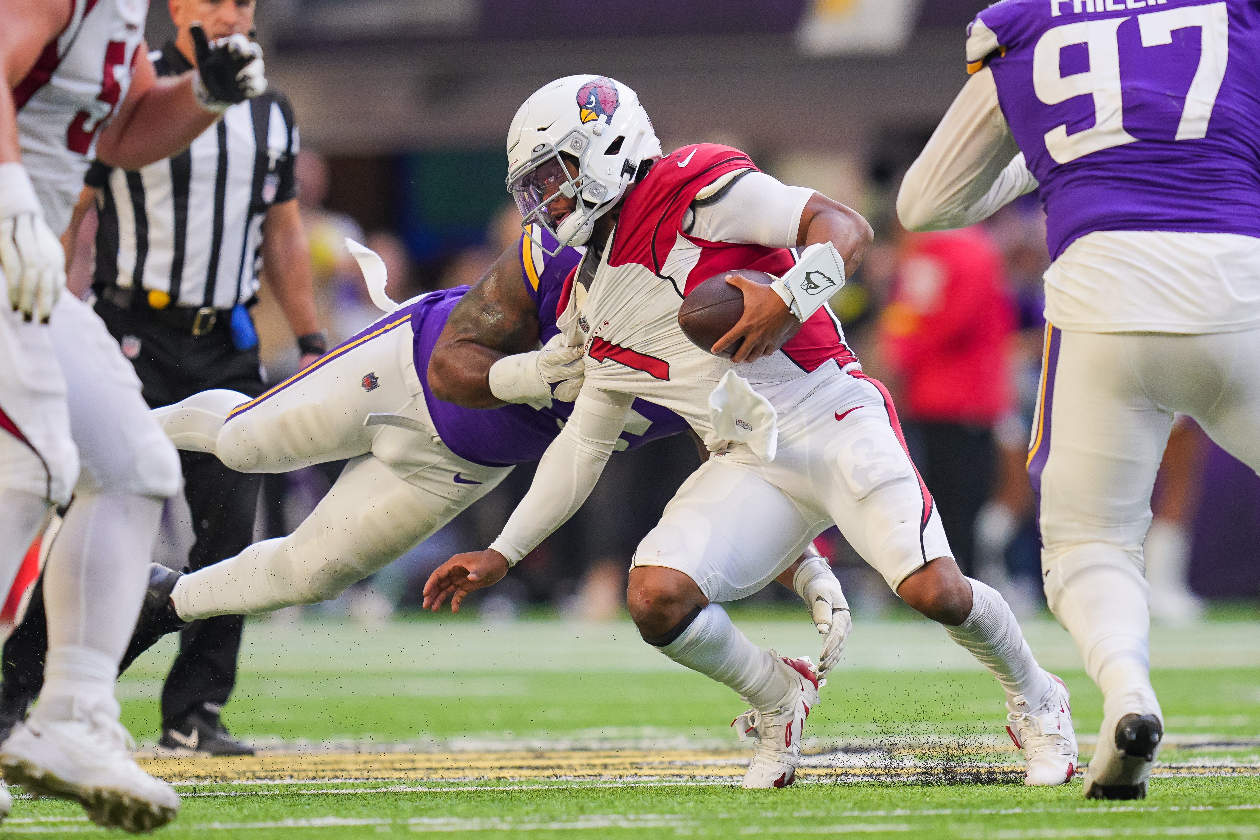 Oct 30, 2022; Minneapolis, Minnesota, USA; Arizona Cardinals quarterback Kyler Murray (1) is tackled by Minnesota Vikings linebacker Za'Darius Smith (55) in the fourth quarter at U.S. Bank Stadium.