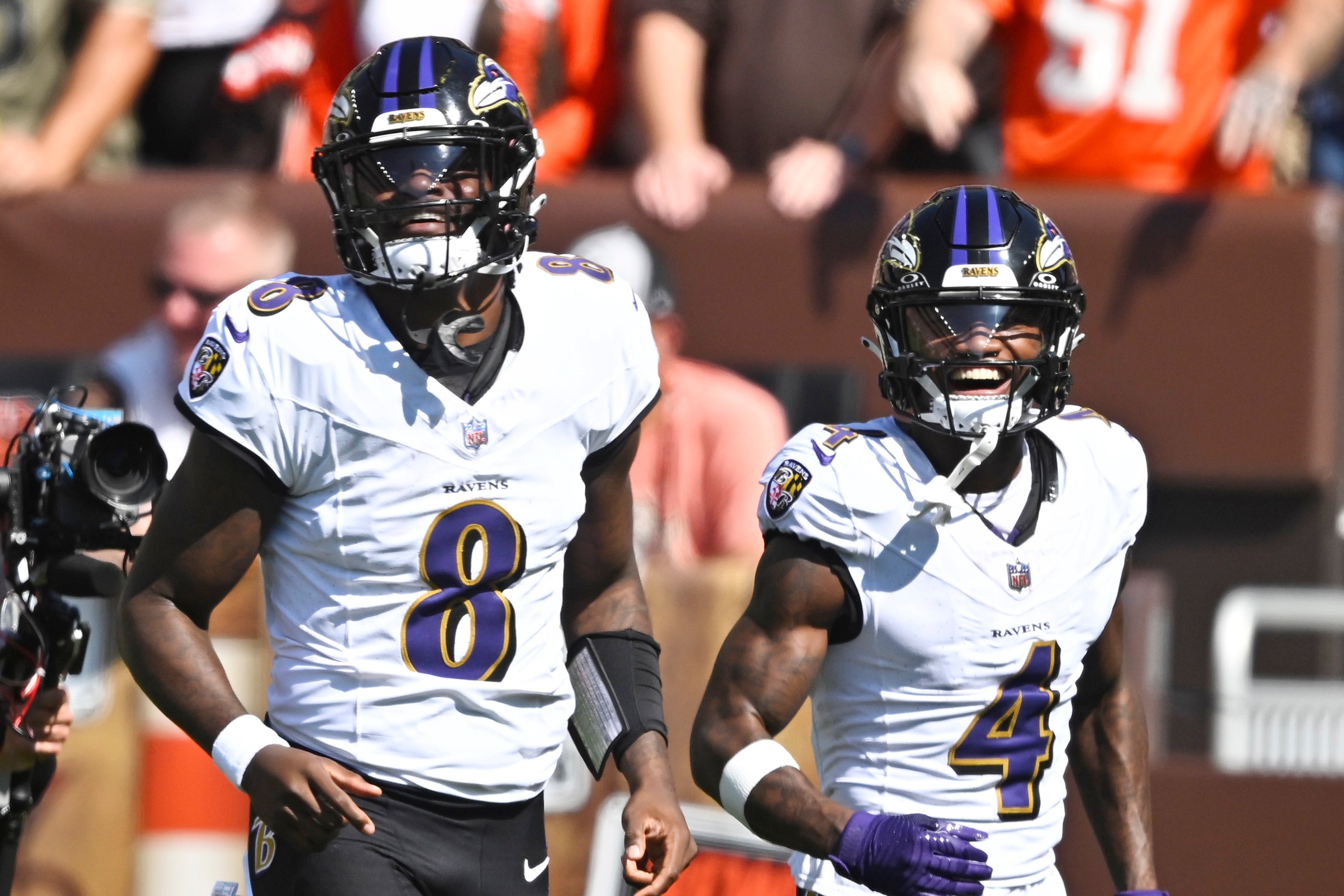 Oct 1, 2023; Cleveland, Ohio, USA; Baltimore Ravens quarterback Lamar Jackson (8) celebrates his rushing touchdown with wide receiver Zay Flowers (4) in the first quarter against the Cleveland Browns at Cleveland Browns Stadium.