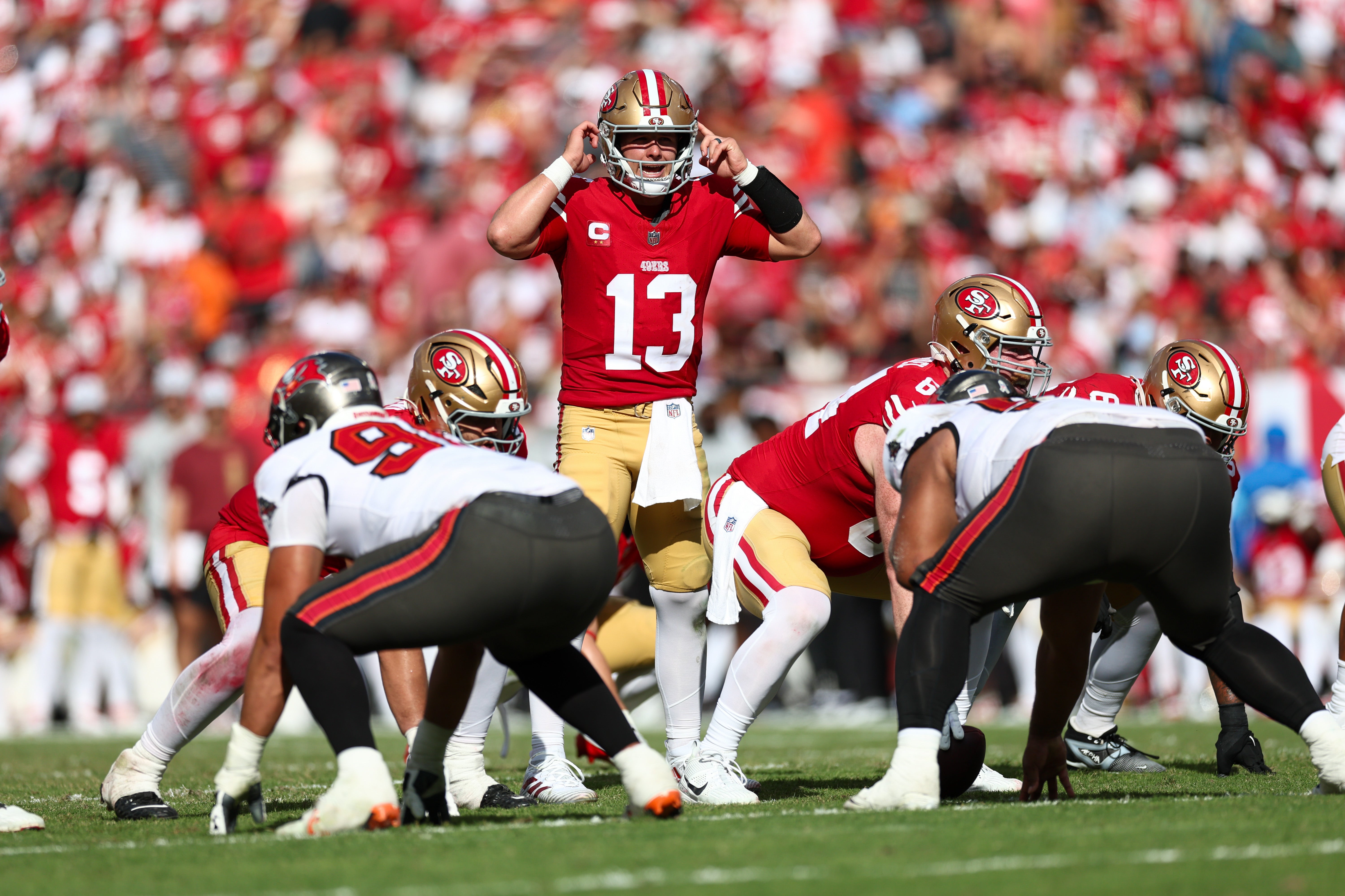 San Francisco 49ers quarterback Brock Purdy (13) calls play at the line against the Tampa Bay Buccaneers in the third quarter at Raymond James Stadium.
