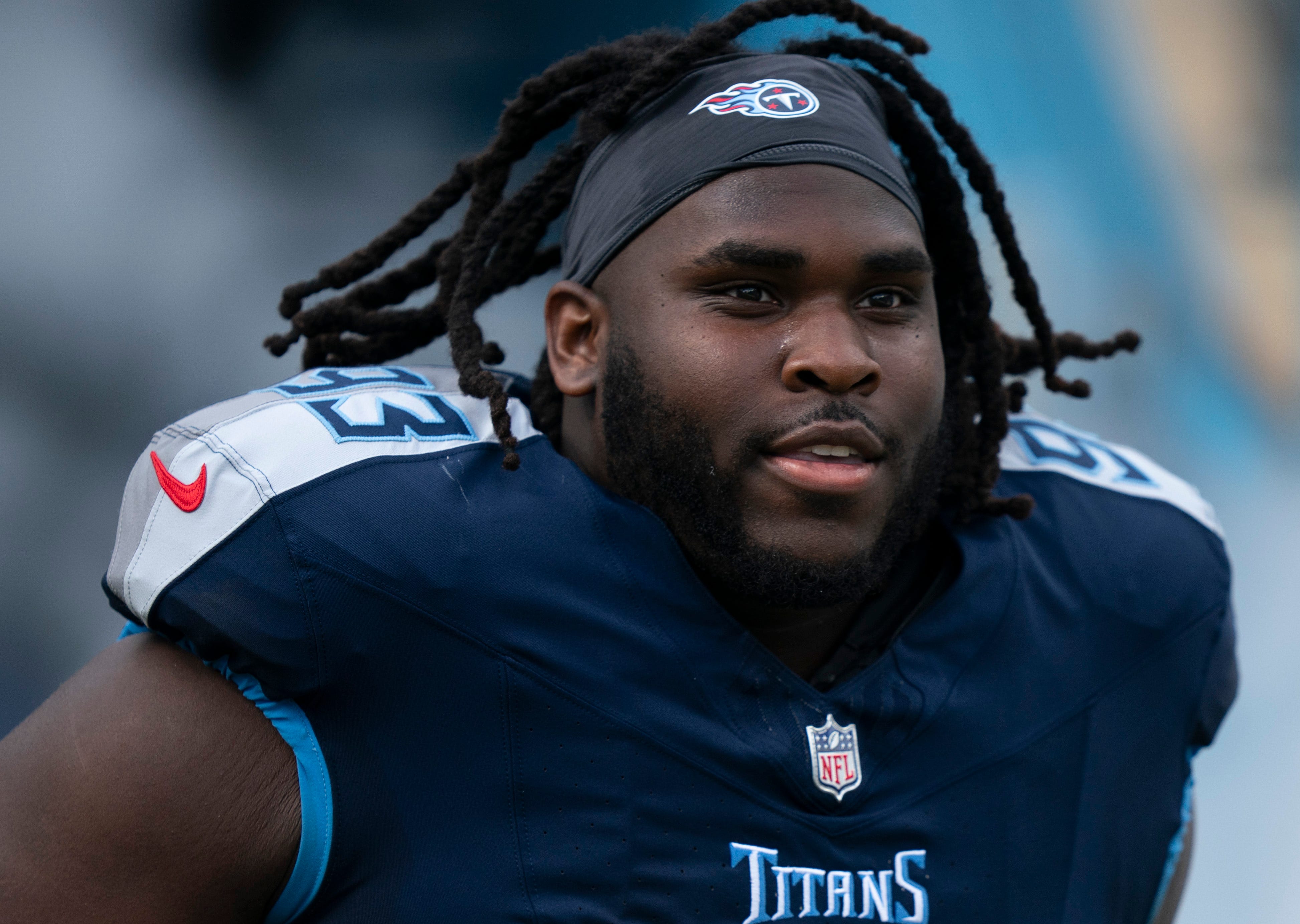 Tennessee Titans defensive tackle T'Vondre Sweat (93) takes the field before their game against the New England Patriots at Nissan Stadium in Nashville, Tenn., Sunday, Nov. 3, 2024.