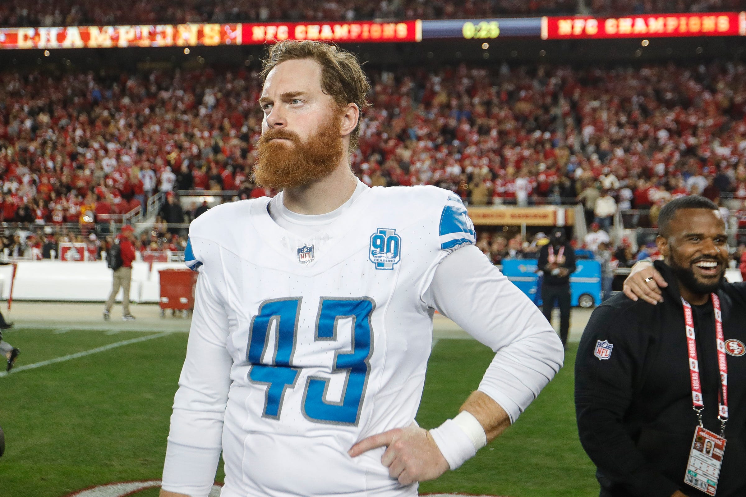 Lions long snapper Jake McQuaide watches the 49ers celebrate after the Lions' 34-31 loss in the NFC championship game in Santa Clara, California, on Sunday, Jan. 28, 2024.
